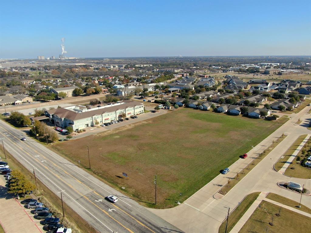 Beautiful 3.1-ACRE COMMERCIALLY ZONED PROPERTY on FM 663, directly across from MIDLothian HIGH SCHOOL. This PRIME LOCATION offers EXCELLENT ROAD FRONTAGE with LOTS OF DAILY TRAFFIC, providing OUTSTANDING EXPOSURE for your business. UTILITIES, including ELECTRICITY and WATER, are readily available, making DEVELOPMENT CONVENIENT and COST-EFFECTIVE. The LEVEL ACREAGE allows for FLEXIBILITY in BUILDING DESIGN, PARKING, and SITE LAYOUT, accommodating RETAIL, OFFICE, MEDICAL, or SERVICE-BASED BUSINESSES.
Situated in an ESTABLISHED AREA with a strong surrounding COMMERCIAL PRESENCE, this property offers a rare opportunity to position your business in a HIGH-VISIBILITY, HIGHLY ACCESSIBLE location. Its proximity to a major SCHOOL, RESIDENTIAL NEIGHBORHOODS, and key ROADWAYS ensures CONSISTENT TRAFFIC and excellent CUSTOMER REACH. Whether you are looking to BUILD A NEW BUSINESS or EXPAND AN EXISTING OPERATION, this tract provides the SPACE, UTILITIES, and EXPOSURE needed to succeed.