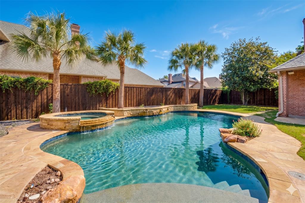 Experience the pinnacle of West Plano living in this stunning Robert Balkman custom estate, where architectural elegance meets resort-style comfort. Spanning over 7,400 square feet, this 6-bedroom masterpiece is situated on a premier lot within one of the area's most prestigious guard-gated communities. The heart of the home is a chef’s dream, featuring a gourmet kitchen equipped with professional-grade Viking appliances, quartz countertops, dual pantries, and a built-in refrigerator. The executive primary wing serves as a private sanctuary, offering a spa-inspired bath, sitting area, and a palatial walk-in closet. Entertainment options are endless, host cinematic movie nights in the professional home theater, or enjoy the expansive game room complete with a dry bar and piano area. Functional spaces abound, including a dedicated home office and a secondary Mom’s office for ultimate organization. A standout feature of this property is the rare, detached guest house. This full-service suite includes its own kitchen, living area, and laundry perfect for multi-generational living, a long-term guest suite, or a private poolside cabana. The backyard is a private sanctuary featuring a custom pool with elegant water features and lush, manicured landscaping. The gated motor court provides enhanced security and leads to a 4-car garage. Integrated sound system and smart home capabilities. Multiple graceful fireplaces throughout. Located in the sought-after Plano ISD. Premier guard-gated security for peace of mind. This is more than a home; it is a legacy property designed for those who demand excellence in every detail. Schedule your private tour to experience the sophistication of 1809 Cliffview Drive.
