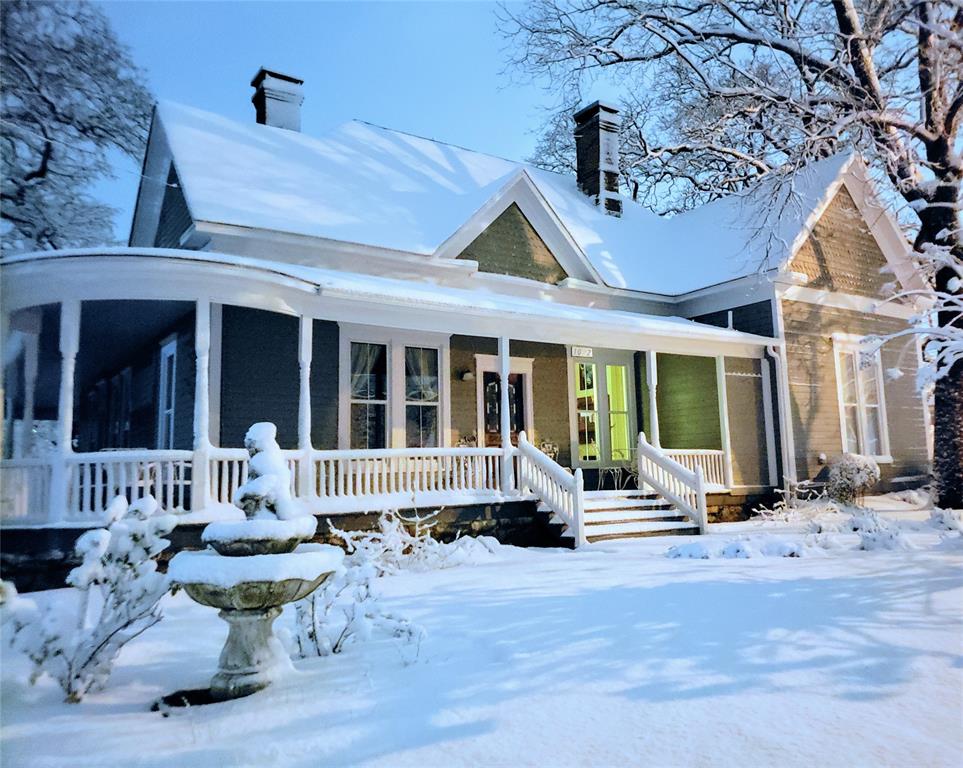 Investors welcome! This beautiful hotel, located on a corner LOT, only half block from Tarleton State University is an asset gain in itslef and with a TURN KEY Commercial HOTEL, it makes it one to condiser.  The Gallery House Boutique Hotel, opened for business in September 2020 and well received for six years running! This Craftsman Home, built in 1895, took two years to restore and convert into a Hotel.
Located half block from TSU and with room to expand.  Featuring four private rentable rooms, elegantly designed and all with modern conveniences. Zoned Mini splits in every room, smart T.V., microwave, mini fridge, custom showers, hardwood floors throughout. Hotel features 10 foot ceilings with re-claimed vintage stamped tin in all three downstairs KING rooms, each with a different design. Five original fireplaces, Commercial gas tankless water heater, externally mounted, along with professional water softner system which protect fixtures, shower doors and appliances. Grounds include, a detached office studio with private bath and zoned heating and air, custom rock patios, sidewalks, courtyards and native landscaping.  An asphalt parking lot with an ADA concrete slap provides safe parking off the street, with a designated Entrance and Exit. An ADA cement ramp with railing, plus steps from parking lot lead guest to our beautiful wrap around porch to access Hotel. Property has room to build Phase II if desired, which would include the addition of three rental units on one foundation. Sewer tap in place and parking lot built with 14 spaces to accomodate future expansion. The Gallery House has excellent reviews, repeat guest, local business, corporate travel, sub-contractors and transient weekend buisness. The Gallery House has an establised website capturing majority of reservations. Walking distance to TSU, Historic Downtown, and Hospital district. Property is an asset gain as Tarleton State University grows expenditually in all directions.