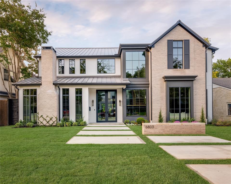 Located on an exceptional block of Lakewood, this new build by Stainback, custom builder, offers a combination of modern & traditional design, the perfect opportunity to create your own lifestyle. Enjoy ample room to entertain, relax & unwind w beautiful views of the neighborhood. The chef’s kitchen boasts a marble island, Wolf range & SubZero refrigerator while a chic butler’s pantry has a Miele coffee maker, Wolf microwave, wine fridge & ice maker. Enjoy a sophisticated study w fireplace & built in cabinets. Upstairs is a family room w wet bar & refrigerator plus workout room. The primary suite includes a fireplace, electric shades & a spa-like bath w soaking tub, double vanities, Neorest toilet & custom closet. Designer tile & lighting, brick accent walls, Sonos surround sound, complete smart home system, Pella windows & doors, 9” hardwood floors & more. Outside enjoy a covered patio & turfed backyard w putting green. Don't miss your opportunity to experience timeless luxury!