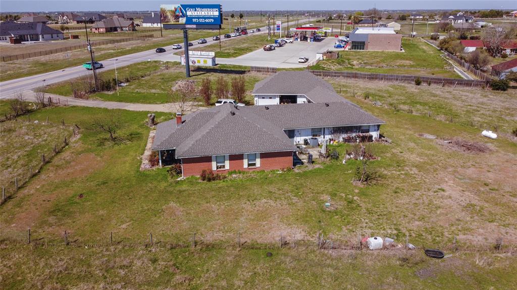 Listed at just under $17 per square foot and located in the path of the upcoming Outer Loop, this combined 6.84-acre tract offers exceptional potential for future commercial development in one of Rockwall County’s fastest-growing corridors. With approximately 620 feet of frontage on SH 205, the property provides strong visibility and access, making it well suited for retail, office, service, or mixed-use development. Utilities are available, and planned transportation improvements are expected to significantly enhance accessibility and long-term value. The value of this property is in the land, not the existing improvement. Property also includes a land lease for an on-site billboard, providing additional income potential. Ideal opportunity for investors, developers, or end users looking for a strategic location in the path of future growth. Rare opportunity to secure acreage in a high-growth area with strong commercial potential.