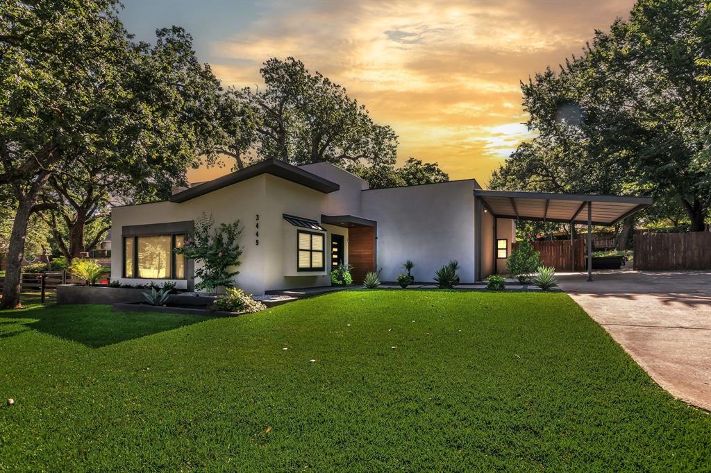***Seller is offering a $10,000 credit at closing for the buyer to use toward closing costs, a rate buy-down, or how they wish!*** Nestled in the heart of Grapevine, this stunning property offers a rare sanctuary on a sprawling half-acre wooded lot. Shaded by a soaring canopy of mature, towering trees, the backyard provides a private park-like setting that is increasingly hard to find. The location is truly unbeatable, situated just two blocks from the beloved Parr Park and within walking distance to exemplary elementary, middle, and high schools in the highly sought-after Grapevine-Colleyville School District. Commuters and travelers alike will appreciate being only a short drive from the airport.

Inside, you are greeted by a light and bright open-concept floor plan designed for modern living. The expansive great room serves as the heart of the home, featuring a cozy wood-burning fireplace and a magnificent wall of windows that invites the beauty of the outdoors inside. The gourmet kitchen is a showstopper, boasting elegant granite countertops and a striking turquoise tile backsplash that adds a unique touch of character. For those working from home, the formal dining area is perfectly suited for a quiet office space.

The primary suite offers a peaceful retreat with direct exterior access to the lush grounds. Additional features include spacious secondary bedrooms, a bathroom with dual sinks, and a guest house that can also be used as a dedicated office or mother-in-law quarters. This home is as functional as it is beautiful, equipped with energy-efficient heating and cooling systems to ensure year-round comfort. The exterior is equally impressive, featuring a large storage shed with electricity, a substantial deck for entertaining, and ample space for recreational vehicle or boat parking. This is a rare opportunity to own a piece of Grapevine paradise that perfectly balances natural beauty with modern convenience.