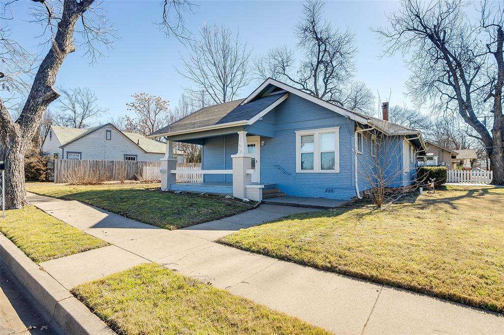 Step back in time on the huge front porch without sacrificing modern convenience in this beautifully maintained 1930s cottage. Nestled on a spacious corner lot shaded by mature pecan trees, this 2-bedroom, 2 Full bathroom gem radiates curb appeal with its crisp new exterior paint and classic silhouette.
Inside, the work has already been done to update this beauty, you’ll fall in love with the expansive living area, featuring elegant built-in bookshelves and a stately mantle that serves as the heart of the home. The light and bright kitchen boasts butcher block counter tops, updated Appliances, a beautiful backsplash and ample space for the home chef. Retreat to the primary suite, where a private, oversized deck offers the perfect sanctuary for your morning coffee. The center of the home features a bonus room that would be perfect for an Office or Nursery. Original hardwoods and French Doors add to the Charm of this Stately home. A detached storage shed add functionality. This property is the perfect blend of Original Cleburne charm and worry-free living. Don't miss your chance to own a piece of local history. Seller is willing to contribute $5,000 towards buyers closing costs or to buy down a rate with an acceptable offer.