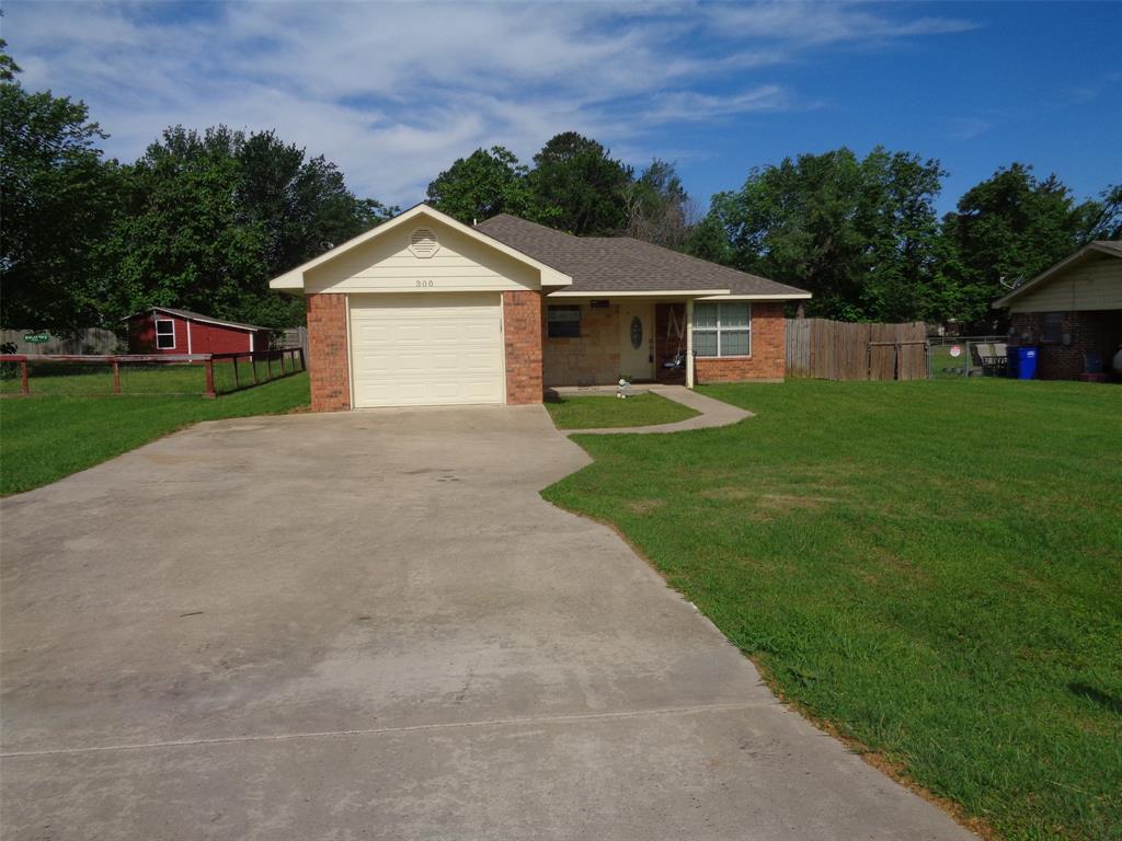 Remodeled and updated super cute home with covered front and back porches!  HUGE WORKSHOP in back insulated and with electrical.  Roll door and regular door entrances to workshop.   Remodeled Kitchen with granite counters, custom shaker style cabinets, all LG appliances including double convection oven 2023,  replaced roof 2023,  total remodel of primary bathroom with custom walk in shower, two vanities and tile flooring.  Large primary bedroom with spacious walk in closet.  Open floor plan with kitchen and dining open to the living room.  Recent interior painting and flooring.   This one is ready to move in.  The home is situated on almost a fourth of an acre.  Rare find with these specialty updates and workshop at this price.   Don't miss it!  Refrigerator stays. No HOA!
