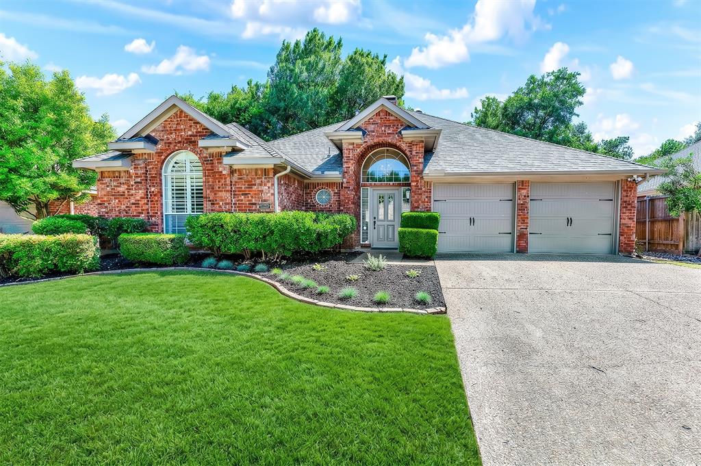 Absolutely gorgeous single-story in Stonebridge Ranch’s Briar Ridge neighborhood with luxury finishes and designer details throughout. From the moment you walk in, this home feels elevated with beautiful wood floors, soaring ceilings, custom lighting, oversized baseboards, solid-core doors, and a stunning floor-to-ceiling tiled fireplace that anchors the main living space. The layout is incredible with TWO oversized living areas designed for both entertaining and everyday comfort. The family room is filled with natural light from the wall of windows overlooking the serene backyard and also features custom built-ins and a wet bar. The kitchen is beautifully updated with designer quartz countertops, white shaker cabinetry with soft-close drawers, under-cabinet lighting, gas range with air fry feature, all upadated stainless steel appliances in kitchen.
The primary suite feels like an upscale private retreat with a spa-style bath featuring quartz counters, a freestanding tub, oversized frameless glass shower, and walk-in closet. Secondary bedrooms are generously sized with walk-in closets as well. Major upgrades include a top-of-the-line Lennox Elite HVAC system, replaced  water heater, garage door openers, updated master closet , all wooden blinds and custom landscape in both the back and front of home. Every inch of this home has been thoughtfully updated and impeccably maintained. Truly move-in ready and absolutely stunning close to exemplary schools, shopping, Adriatica, Stonebridge Ranch incredible amenities.