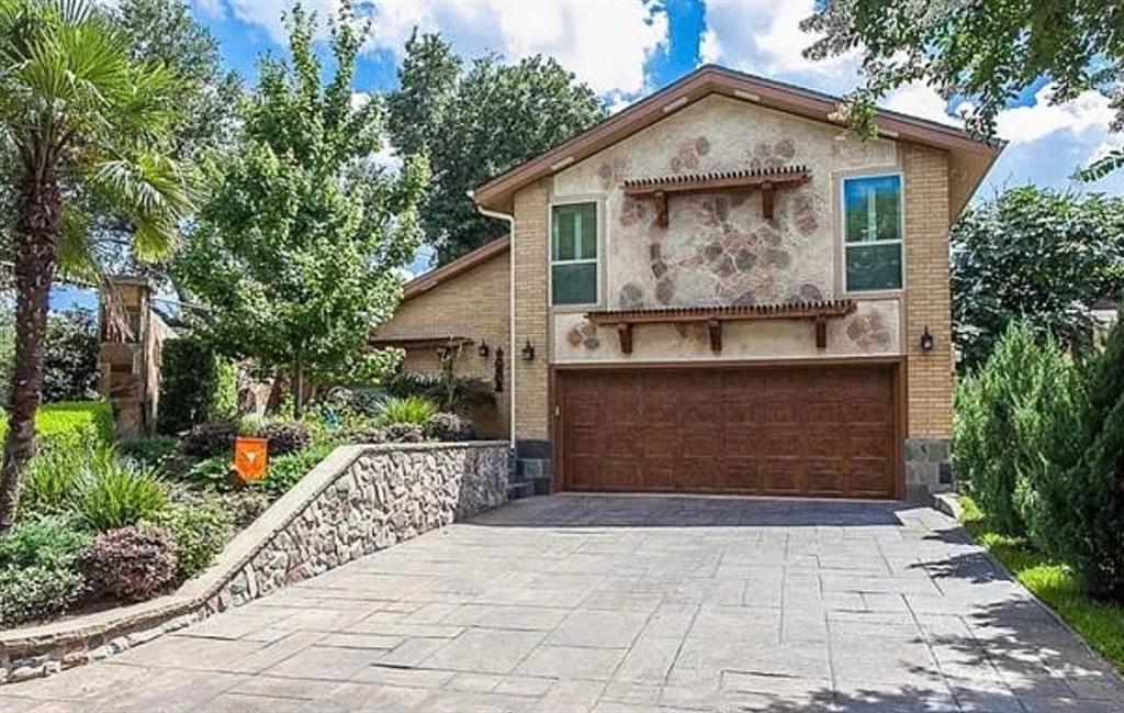 Welcome to an exceptional residence in the highly sought-after Bent Tree Village, where timeless elegance meets modern luxury just moments from Bent Tree Country Club, premier shopping, and fine dining. Thoughtfully updated and meticulously maintained, this stunning home offers an elevated lifestyle in one of North Dallas' most desirable neighborhoods. Rich 7-inch plank hardwood floors flow throughout the home, creating a warm and sophisticated backdrop for everyday living and entertaining. At the heart of the home, the chef-inspired kitchen is appointed with an impressive collection of professional-grade appliances, including a Sub-Zero built-in refrigerator, Viking gas range, double ovens, warming drawer, microwave, and dishwasher—perfectly designed for both casual meals and memorable gatherings. The spacious living room and luxurious primary suite each feature their own gas fireplace, creating inviting spaces to relax and unwind. A true retreat, the primary suite offers the rare luxury of separate his-and-her bathrooms, providing unparalleled comfort, privacy, and convenience. Adding to the spa-like experience is a private sauna, allowing you to enjoy resort-style relaxation without ever leaving home. Wine enthusiasts will appreciate the secure, climate-controlled wine closet, ideal for showcasing and preserving a treasured collection. Step outside to your private backyard oasis, where a recently resurfaced sparkling pool sets the stage for summer entertaining, weekend relaxation, and year-round enjoyment. Combining luxury amenities, thoughtful design, and an unbeatable location, this remarkable Bent Tree Village home offers a rare opportunity to enjoy refined living at its finest.
