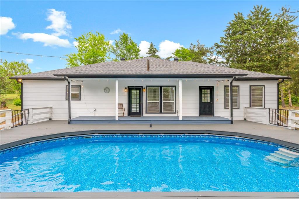 Tucked away at the end of a quiet dead-end road and surrounded by beautiful mature trees, this stunning 4-bedroom, 2-bathroom home offers the perfect blend of privacy, comfort, and modern convenience, all within the highly sought-after Lindale ISD. From the moment you step inside, you'll love the open-concept layout with a split floor plan, ideal for families who want shared living spaces without sacrificing privacy. Vinyl plank flooring runs throughout the entire home, offering a clean, contemporary look that's as durable as it is beautiful. Cozy up on cool evenings beside the fireplace, or gather the whole family in the charming kitchen, perfectly designed for everyday meals and weekend entertaining alike. Step outside and discover your own backyard paradise. The sparkling pool, newly relined and surrounded by low maintenance composite decking, is ready for summer fun from day one. A pre-built hot tub platform means your relaxation upgrade is already halfway done. As the sun goes down, gather around the firepit for the kind of evenings you'll never want to end. Need extra space? A dedicated storage building keeps tools, toys, and gear organized and out of sight. And with solar panels already in place, you'll enjoy significantly reduced energy costs month after month, a smart investment that pays for itself. Located just minutes from Interstate 20, commuting is effortless without ever sacrificing that peaceful, tucked-away feeling you'll come home to every day. Homes like this, private, upgraded, move-in ready, and zoned for Lindale ISD, don't come along often. Schedule your private showing today before someone else calls it home.