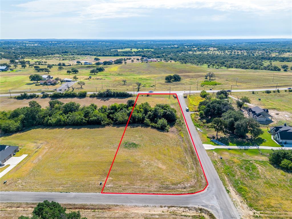 Build Your Dream Home in Greyhound Landing
Discover the perfect blend of privacy and convenience on this beautiful just over two acre lot in the sought after new subdivision of Greyhound Landing. Surrounded by mature trees, this property offers a serene, park like setting while still being just minutes from town. Located within the highly rated Peaster ISD, it’s ideal for those seeking both a peaceful lifestyle and quick access to schools, shopping, and dining. Multiple lots are available, and you even have the option to purchase the adjoining lot to double your space and expand your vision. With plenty of room for your custom home, outdoor living areas, and more, you can create the retreat you’ve always envisioned. Don’t miss the opportunity to own land in one of the area’s most desirable communities