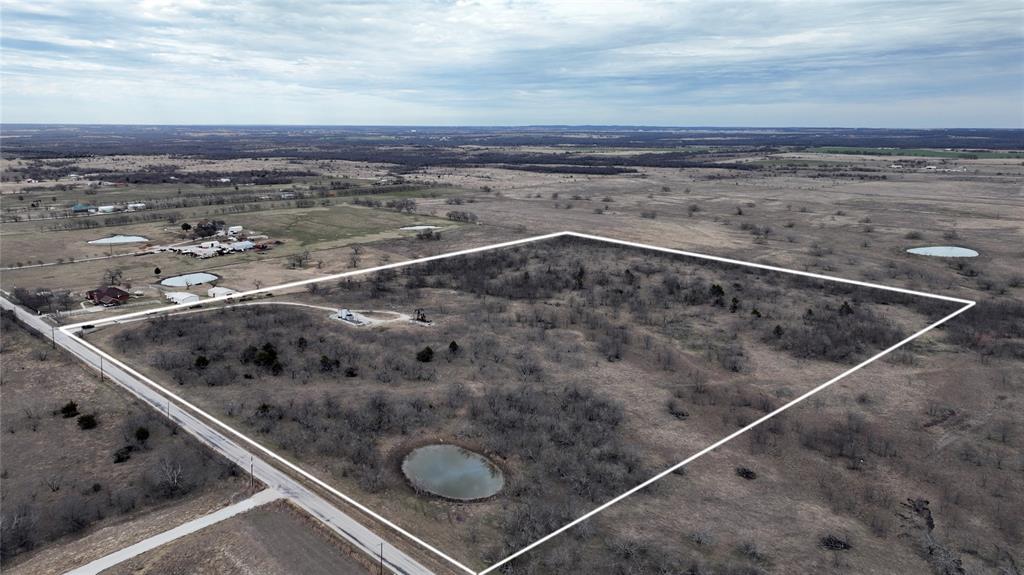 Prime Grayson County acreage just north of US-82, west of Preston Road, and very near the future Tollway corridor. The Sherman area continues to surge with investment and development driven by the new chip plants. Almost 1000 feet of frontage on Wright Road.  This tract is ag-exempt with low carrying costs, fenced on three sides, includes a small cattle pond, and is currently used for grazing by the adjoining lessee. Additional 30.32 acres directly to the south may be available; contact listing agent for details. Seller also owns 14.18 acres nearby MLS 21146907. Seller to retain all minerals.