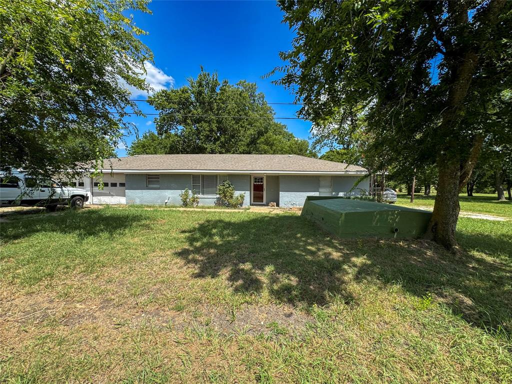 Ready to trade the hustle for a little hush? This charming brick home in Bailey, TX sits on a sweet 1.434-acre slice of country heaven — just enough land to stretch out without needing a tractor. Inside, it’s fresh with new paint, updated flooring, and a sparkling new bathroom. The open kitchen and dining area are perfect for lively dinners or could easily flex into a cozy second living space. Need peace of mind? If you’re dreaming of expanding or gardening, the extra acreage already has a water line — just pop a meter on. Prefer less land? The owner’s open to splitting it. Best part? You get that country vibe with the convenience of city water and sewer, plus a prime location near Highways 11 and 78 for easy commuting in any direction. It’s the kind of place that makes you want to kick off your boots and stay awhile.