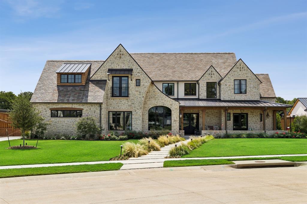 Welcome Home to this Stunning, almost New custom estate where timeless architecture, impeccable craftsmanship, and sophisticated design come together for truly exceptional Luxury living at its best. Nestled on a premiere cul-de-sac lot backing to a private greenbelt, this property boasts lush landscaping and unforgettable curb appeal! Enter the light-filled Great Room that seamlessly connects the indoor & outdoor living spaces. Spectacular Chef's Kitchen features professional Wolf range, Sub-Zero Fridge-Freezer, double Bosch dishwashers, Scotsman nugget ice maker, custom fluted cabinetry, and oversized walk-in Pantry-Prep Kitchen w additional fridge, storage & ample workspace. Executive Study offers monochromatic custom built-ins & stone accent wall. Retreat to the Luxurious Private Primary with vaulted ceiling & oak beam detail, motorized shades, and Spa Bath complete with heated floors, stunning wet room with freestanding tub & oversized shower, plus designer closet with display cabinetry & Wellness room. First floor also has a spacious Family-Game room w full Wet Bar, 2nd Office-Den & Mud area. Upstairs you find 4 Guest Suites w designer finishes, an oversized Game Room w playhouse, climbing & rope ladder, and Reading nook. Smart Home, extensive security & cameras, motorized shades, EV charging capability, Pentair smart pool, Spray Foam Encapsulation & generator-ready infrastructure. CNC machine cut inset cabinetry. Step outside to the private Resort-style Backyard Oasis, a spectacular Pool-Spa boasting a water slide, fire feature, and extensive natural stone surrounding. Multiple entertaining spaces for all to enjoy including covered Outdoor Living w fireplace, outdoor Kitchen, built-in heaters, misting system, outdoor shower, Sonos audio, Trex decking & travertine surfaces, all overlooking the amazing Greenbelt backdrop. DaVinci roof. Every detail of this remarkable residence reflects uncompromising commitment to quality, comfort, efficiency, design and luxury!