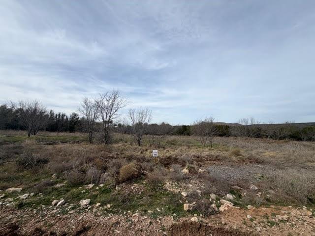 Streets are gravel right now but slated to be finished with asphalt pavement and utilities installed by the summer of 2026. Community center will have mail boxes and a community swimming pool. Boat ramp and courtesy dock available for use by owners.