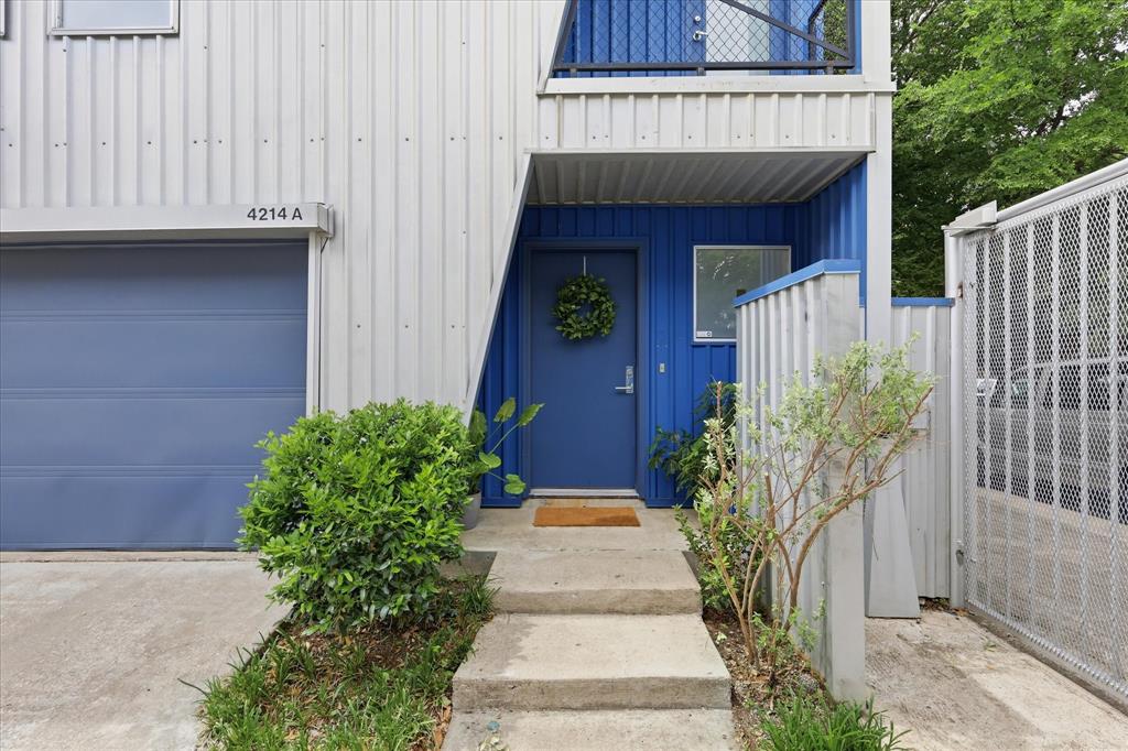 Rare three-story loft-style townhome, offering central city living with the private outdoor space buyers are always hoping to find but rarely do. Located near the Swiss Avenue Historic District, Deep Ellum, Downtown Dallas, Baylor Medical Center, Uptown & the Dallas Farmers Market, this 2-bedroom, 2-bath townhome combines urban convenience with a peaceful, private retreat feel. As a corner unit inside a gated community, the home is filled with natural light and offers added privacy, along with an attached 2-car garage and gated drive for easy parking in the heart of Dallas. Inside, the home has the character and architectural style buyers love in a true loft-style property, including beautiful pine wood floors, modern open wire staircases, lofted ceilings, gallery lighting, and multiple levels that create separation between living, working, relaxing & entertaining. The main living level feels open and bright, with balcony access that brings the outdoors in and gives the home a treehouse-like feel. The outdoor living is what truly sets this home apart. The large flagstone patio backyard features a covered steel pergola, tall privacy fence + generous space for relaxing, entertaining, dining outside, gardening, or simply enjoying quiet evenings at home. In addition to the backyard, the home also includes two additional balconies, creating multiple outdoor spaces that are hard to find. Updated including a new HVAC system in 2024, new flooring on the 1st & 3rd floors, wood flooring on the stairs & second main living area, a remodeled primary bathroom with a WI shower + an Elfa closet organization system in the primary WIC. A separate office space adds even more flexibility for today’s lifestyle. For buyers searching for a Dallas townhome with outdoor space, a gated community, attached 2-car garage, loft-style design, natural light, and quick access to all the hotspots this home delivers a rare combination of location, privacy, style & livability.