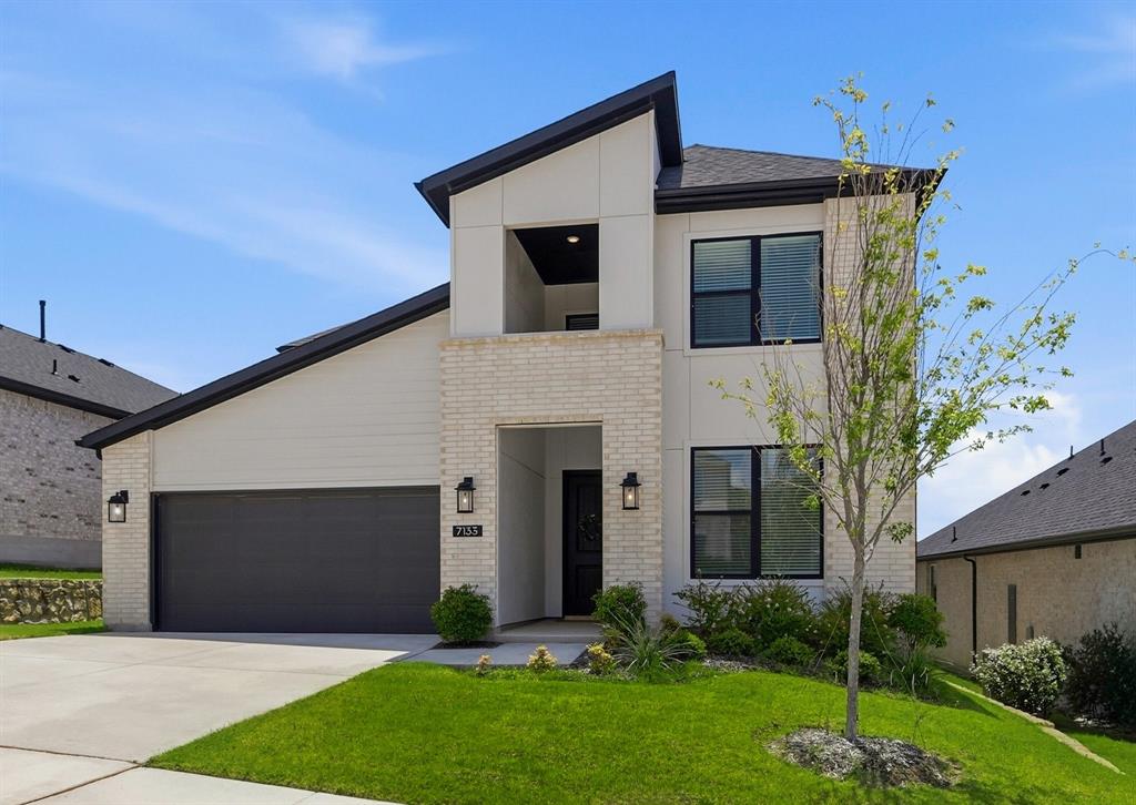 Welcome to 7133 Talon Bluff Drive, a beautifully designed 2024 home that offers all the benefits of new construction without the wait. Even better, a brand-new roof will be installed, providing added peace of mind for years to come. Step inside to warm light wood flooring, abundant natural light, and an open-concept floor plan designed for both everyday living and entertaining.
The stylish kitchen features crisp white cabinetry, quartz countertops, stainless steel appliances, a gas cooktop and range, and a spacious island that flows seamlessly into the dining and living areas, creating the perfect place to gather with family and friends.
The private primary suite is located on the main floor and offers dual vanities, a relaxing garden tub, and a separate shower. A dedicated home office provides the flexibility to work from home, pursue hobbies, or create a fitness space. An additional downstairs bedroom and full bath are ideal for guests, while upstairs you'll find two more bedrooms and a spacious second living area perfect for a game room, media room, or playroom. Whether you need space for movie nights, kids, or simply a quiet place to unwind, make this flexible space work for your lifestyle.
The expanded covered patio creates the perfect outdoor space for grilling, relaxing, or gathering with family and friends year-round.
Life in Talon Hills is about more than just the home. Enjoy community amenities including a resort-style pool, clubhouse, playground, walking trails, green spaces, and lake access to nearby Eagle Mountain Lake for boating, fishing, and outdoor recreation. Conveniently located near shopping, dining, and with easy access to Hwy. 199, Loop 820, and I-35W, you'll enjoy the perfect blend of comfort, convenience, and community.
If you've been searching for a home that feels like new without the wait of new construction, this home is ready to welcome you.