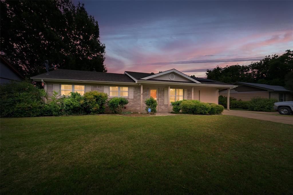 Adorable one story 3 bedroom, 2 bath home nestled in a quiet, friendly neighborhood. Beautiful curb appeal and a welcoming covered front sitting porch. Inside, you'll find nice durable laminate wood flooring that flows through the living room, hallway, and one of the secondary bedrooms. The spacious living room opens to a large kitchen making plenty of room for gathering with friends and family.  The Kitchen features abundant cabinet storage, a pantry, and decorative chair railing. All rooms, including the kitchen, are equipped with ceiling fans to help keep the home comfortable year-round. The private primary suite offers an ensuite bath, while the secondary bedrooms provide flexibility for family, guests, or a home office. Enjoy peaceful mornings and relaxing evenings on the screened back porch, allowing you to unwind outdoors without the nuisance of pesky insects. The beautifully landscaped backyard boasts a large garden bed, a handy storage shed, and plenty of space to enjoy the outdoors. An attached workshop provides the perfect spot for hobbies, projects, or additional storage. Full of charm and functionality, this delightful home is ready to welcome its next owners.