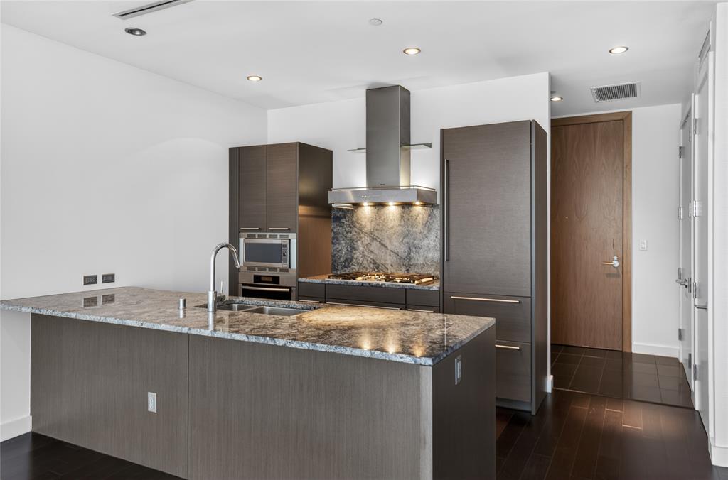 SELLER OFFERING A $10,000 FLOOR CREDIT. Modern Elegance in the Heart of Dallas – Azure Condominium, 4th Floor Welcome to refined urban living in one of Dallas's premier high-rise communities. This 4th-floor residence in the prestigious Azure building offers a sophisticated blend of luxury and comfort with city views and designer finishes throughout. Highlights Include: Spacious open-concept floorplan filled with natural light Floor-to-ceiling windows and a private balcony perfect for views Gourmet kitchen featuring sleek cabinetry, and Miele appliances. Lavish primary suite with a spa-inspired bathroom and a generous closet. Residents enjoy unparalleled amenities including 24-hour concierge, valet service, resort-style pool, fitness center, media room, and more. Located in the vibrant Harwood District, you're steps away from top dining, shopping, and entertainment destinations. This condo is ideal for professionals, or anyone seeking upscale living in the heart of Dallas.