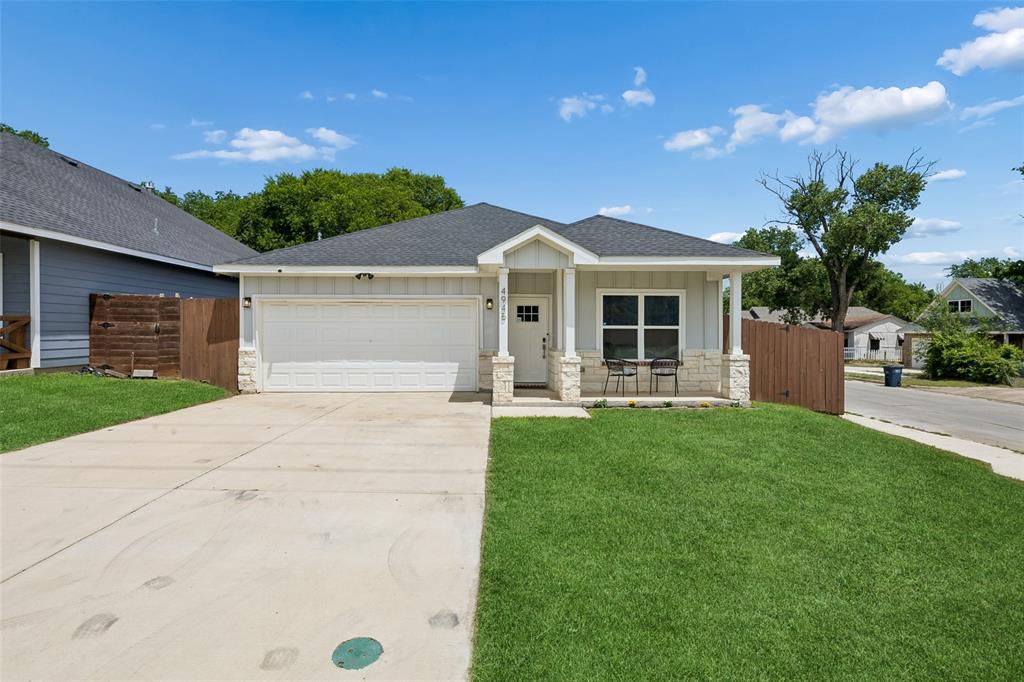 Charming, MOVE IN READY and built in 2023, this beautifully designed 4-bedroom, 2-bath home offers modern comfort, thoughtful upgrades, and incredible convenience in the heart of Fort Worth. Ideally located near major highways and just minutes from Eastover Park, this home combines stylish living with an unbeatable location. From the moment you arrive, you’ll be impressed by the inviting curb appeal featuring a stunning stone-accented front porch. Inside discover the gorgeous plank flooring flowing throughout the main living areas and an expansive open-concept floor plan designed for both entertaining and everyday living. The spacious living room offers the perfect setting for gatherings, relaxing evenings, and great conversation, plus the mounted TV will remain with the home for added convenience. At the heart of the home is the show-stopping kitchen, complete with an oversized island, elegant quartz countertops, farmhouse sink, subway tile backsplash, and sleek stainless steel appliances, truly the centerpiece of the home. Even better, the kitchen refrigerator, washer, dryer, curtains, and curtain rods all convey with the property, making this home truly turnkey. Retreat to the luxurious primary suite, thoughtfully designed as your own private escape. The spacious bedroom flows into a beautifully appointed ensuite bath featuring quartz countertops, a separate shower, and a large walk-in closet. Three additional generously sized bedrooms and a full bath provide plenty of space for family, guests, or home office setup. Outside is a great backyard with a covered patio, perfect for enjoying peaceful evenings or entertaining friends and family. Additional highlights include a $10,000 whole-home water filtration system that has already been paid off, plus an ADT security system with cameras that will stay with the home, offering comfort, convenience, and peace of mind from day one.