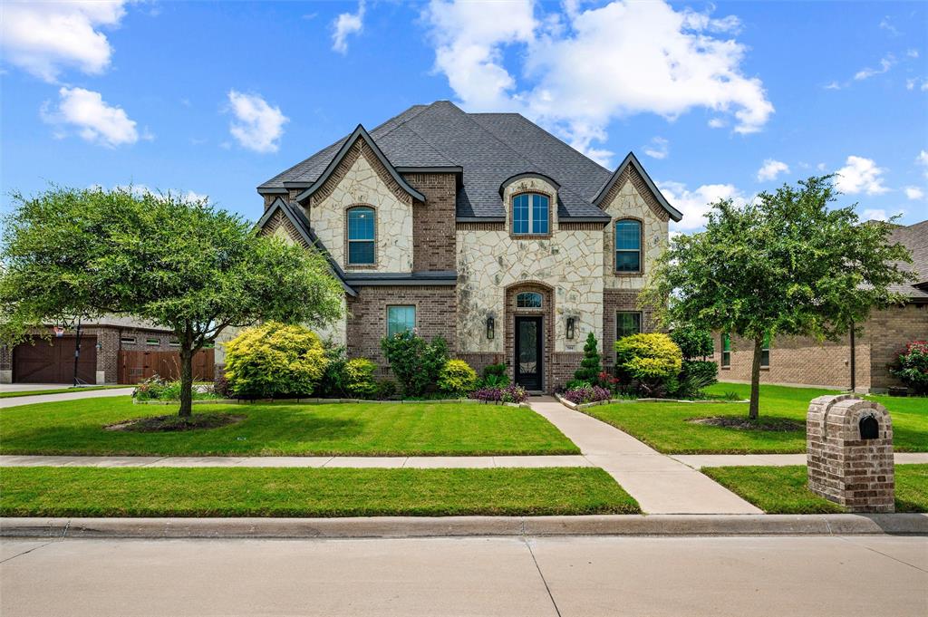 Beautifully maintained home at 504 Stillwater Dr in Waxahachie, Texas, offering the space, layout, and curb appeal buyers are looking for. This 4 bedroom, 3.5 bath home features a striking brick and stone exterior, mature landscaping, and a 3 car garage. Inside, the kitchen anchors the home with rich cabinetry, granite countertops, a large island, stainless appliances, pendant lighting, and an open dining area filled with natural light. The floor plan offers 2 living areas, giving the home flexibility for everyday living, entertaining, a game room, media space, or a quiet retreat. The primary suite feels spacious and polished with a statement accent wall, soft natural light, and room to unwind. A dedicated office with French doors adds even more function for working from home, studying, or creative use. Upstairs, the secondary living space and media-style room create a great setup for movie nights, games, or hosting. The backyard features a covered patio, extended outdoor living space, and views toward the neighborhood canal, giving the yard a more open and relaxing feel. With 4 bedrooms, 3.5 baths, multiple living spaces, a 3 car garage, and a desirable Waxahachie location, this home delivers comfort, style, and versatility in one complete package.