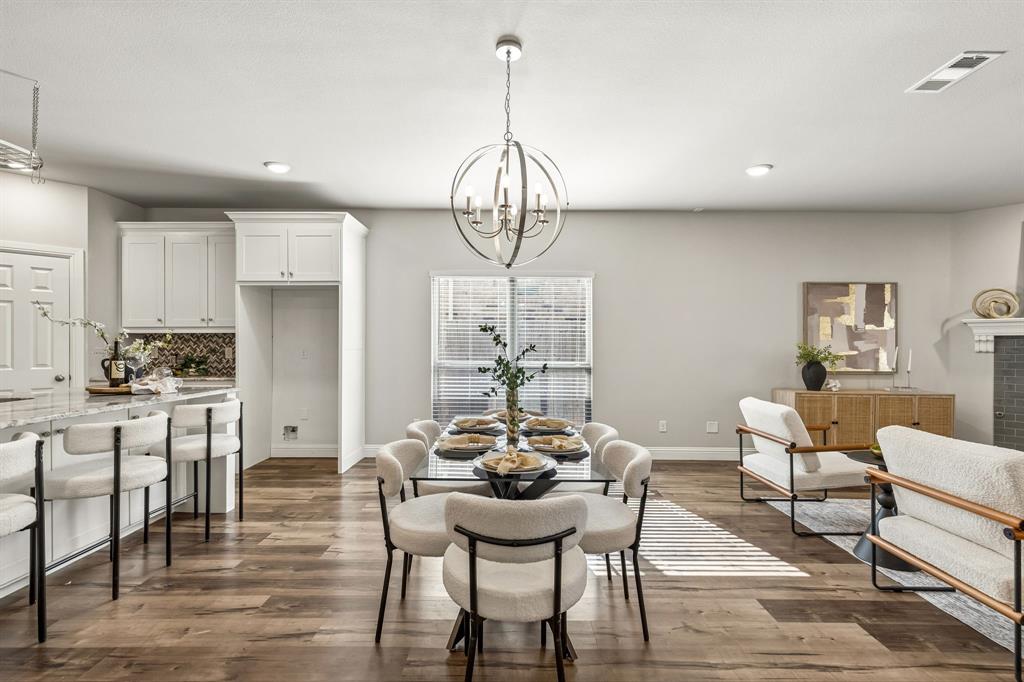 Welcome to this beautifully maintained and thoughtfully designed home offering a seamless blend of comfort, style, and functionality. From the moment you arrive, you’ll appreciate the charming curb appeal, mature landscaping, and inviting front covered porch. Inside, an open-concept layout is highlighted by rich wood flooring, abundant natural light, and a neutral, modern palette. The spacious living area centers around a cozy fireplace and flows effortlessly into the dining space and chef-inspired kitchen, complete with a large island, stainless steel appliances, gas cooktop, ample cabinetry, and a stylish backsplash—perfect for both everyday living and entertaining. The private primary suite is a true retreat, featuring a tray ceiling, generous proportions, and a spa-like ensuite bath with dual vanities, a soaking tub, and a deep walk-in frameless shower designed for relaxation. Secondary bedrooms are well-sized and versatile, offering comfortable accommodations for family or guests. Secondary bathroom is finished with granite countertops, dual sinks, clean tile work, and a light, airy feel that carries throughout the home. Fourth bedroom is wonderful option for office or flex space providing the ideal work-from-home setup or optional second living area, adding to the home’s overall flexibility. Step outside to enjoy a well-sized backyard, with landscape turf, to play or entertain. Ideally located with convenient access to Downtown Roanoke, and with quick access to I-114, this area is known for its vibrant dining and entertainment scene, as well as nearby shopping. Zoned to Northwest ISD. BRAND NEW CARPET.