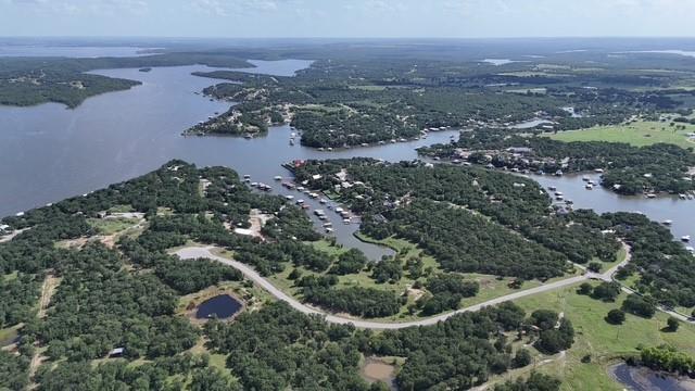 Check out this beautiful 2 acre lot on the water of Lake Bridgeport! This lot is ready for you to build your dream forever home or a weekend getaway perfect for family gatherings. There is electricity located on the front corner and you will need dril a well and put a septic system in when your ready to build.  There is a stone retaining wall built along the water that gives a beautiful setting while enjoying the water during the hot summer days!  Please contact listing agent for further details.