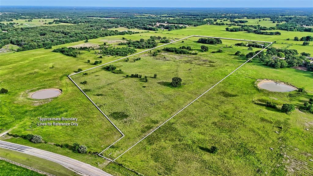 Nearly 32 acres of wide-open Texas land where the possibilities feel just as big as the views. Located just outside Whitesboro city limits, this unrestricted property gives you the freedom to build, create, and live exactly how you’ve been imagining.

Picture your future home set against a backdrop of rolling countryside—morning coffee overlooking the pond as the sun comes up, and evenings spent on the porch watching the sky stretch for miles. With multiple ideal building sites, you can choose to be tucked near the water or perched higher on the hill to take in sweeping northern views.

With NO deed restrictions, the options are wide open. Build a custom home, a barndominium, or create your own small ranch with room for horses, cattle, and more. The property is Ag Exempt, offering valuable tax benefits, and provides the peace and privacy of country living without sacrificing quick access to Whitesboro.

Whether you’re ready to build now or planning for the future, this is the kind of land that turns ideas into a lifestyle.