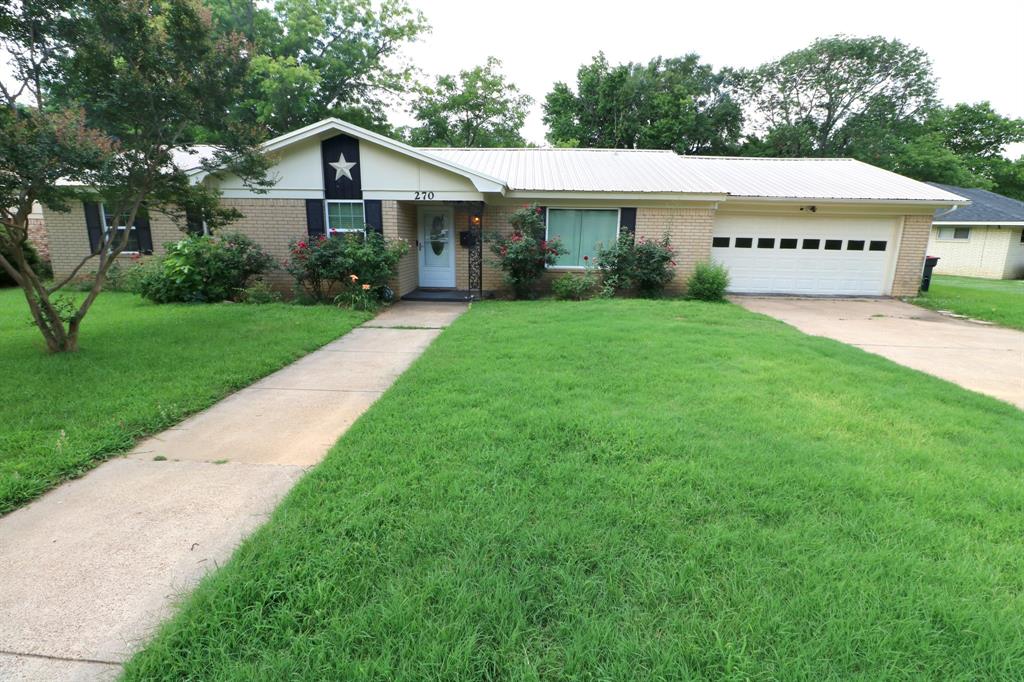 Welcome to your own suburban oasis in the heart of Paris! This 3-bedroom, 3-bath home offers generous living space and a backyard that truly sets it apart.

Inside, you'll find both a formal living room and a large den, providing plenty of space to gather, entertain, or simply spread out. The den opens to the kitchen and breakfast bar, creating a comfortable hub for everyday living, while a attached dining area offers the perfect setting for family meals and special occasions.

The private primary suite includes its own bathroom, while two additional bedrooms share a convenient Jack-and-Jill bath. A bonus room with a full bathroom offers exceptional flexibility and could serve as a guest suite, home office, game room, hobby space, or second living area.

Outside, the property truly shines. The large fenced backyard provides plenty of room for pets, play, gardening, or entertaining. Enjoy the view year-round from the enclosed heated and cooled patio, or step outside to the additional patio area that's perfect for grilling and outdoor gatherings.

With an attached garage, versatile floor plan, and convenient location near shopping, dining, and everyday amenities, this home offers the space you need with the backyard you've been looking for.

Schedule your private showing today and experience this Paris oasis for yourself!