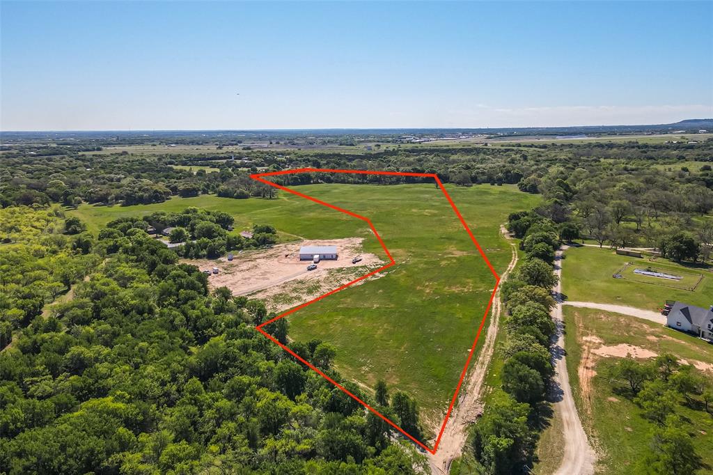 This prime 17.4 acre property is a flagship offering within a select plat, with additional neighboring lots also available for purchase. This parcel delivers immediate value, featuring significant frontage along Stroud Creek and key utilities already in place, including power and water on site. The ideal homesite has been professionally cleared and situated on high ground, firmly out of the primary flood zone, with the lower flood area contained to the rear creek portion for recreation. The land is characterized by numerous mature pecan trees and other valuable hardwoods. Crucially, all mineral rights are included in the sale, elevating this from a beautiful tract to a serious, long-term asset. Whether for a ready-to-build private estate, a development project, or simply a secure land banking opportunity, this property provides ample space, privacy, and a convenient drive to town. Contact us immediately to secure this parcel or to request the full plat map of available lots.