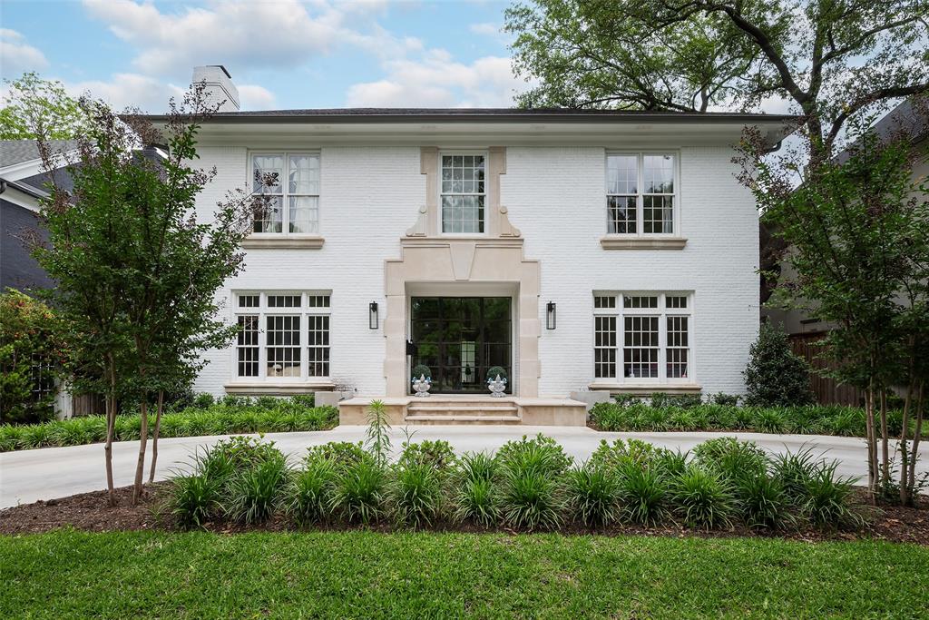 Situated on one of the most coveted blocks in Highland Park & walking distance to Armstrong Elementary. This home has been completely remodeled by Hudson with no detail left unturned. Home boasts elegance with high ceilings, formal living and dining, an abundance of natural light & generous living spaces; perfect for family living & entertaining. Gourmet kitchen is a chef's dream, featuring an expansive island, ample storage, stainless steel appliances, breakfast nook that seamlessly flows into the family room. Second floor unveils a luxurious primary suite, complete with separate his and her bathrooms, walk-in closets, a sitting area, a fireplace, and French doors that open onto a balcony overlooking the backyard oasis. Three more generously sized bedrooms, each with its own ensuite bathroom. The backyard is a true haven, offering a covered patio, a pristine pool, lush synthetic turf, and detached guest quarters, all contributing to the perfect blend of indoor and outdoor living.