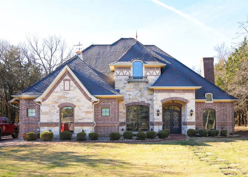 Beautiful move-in ready two-story home located in the premier 1,300-acre master-planned community of Rock Creek Golf Club & Resort near the shores of Lake Texoma. This well-maintained European-style home features 4 bedrooms, 3.5 baths, a formal dining room, breakfast nook, private study, and a spacious patio with fenced backyard perfect for relaxing or entertaining. 

Interior highlights include gorgeous hand-scraped wood floors, elegantly stained crown molding, fresh paint throughout, and brand new upgraded carpet. The climate-controlled garage with stained concrete floors provides easy maintenance and added functionality. All appliances can remain with the home, making this a truly turnkey opportunity.

Rock Creek offers a resort-style lifestyle with access to an 18-hole championship golf course designed by Jack Nicklaus. Residents enjoy exclusive amenities including a clubhouse and restaurant, private marina and boat docks with access to Lake Texoma, resort-style pool and pool house, fitness center, scenic Cross Timbers hiking trails, hotel accomodations, and 24-hour gated security.

Experience the perfect blend of luxury, recreation, and lake living in one of North Texas' most sought-after resort communities.