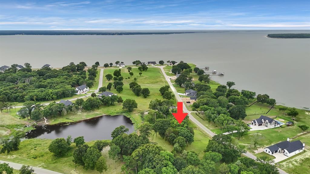 MOTIVATED SELLERS!! Experience the luxurious lake living this community offers! This property features water views from the front and the back of the lot. Located in a gated community off of Cedar Creek Lake. This community offers plenty of amenities including a pool, gym, and club house space. This lot has private access to the community pond where catch & release fishing as well as kayaking is allowed. This lot is located next to a community space; therefore, the lot will only have 1 neighbor, located on the right-hand side of the lot. Easy access to the community boating dock. Located near Cedar Creek Country Club and golf course. This lot offers a great opportunity to make this space a forever or vacation home!