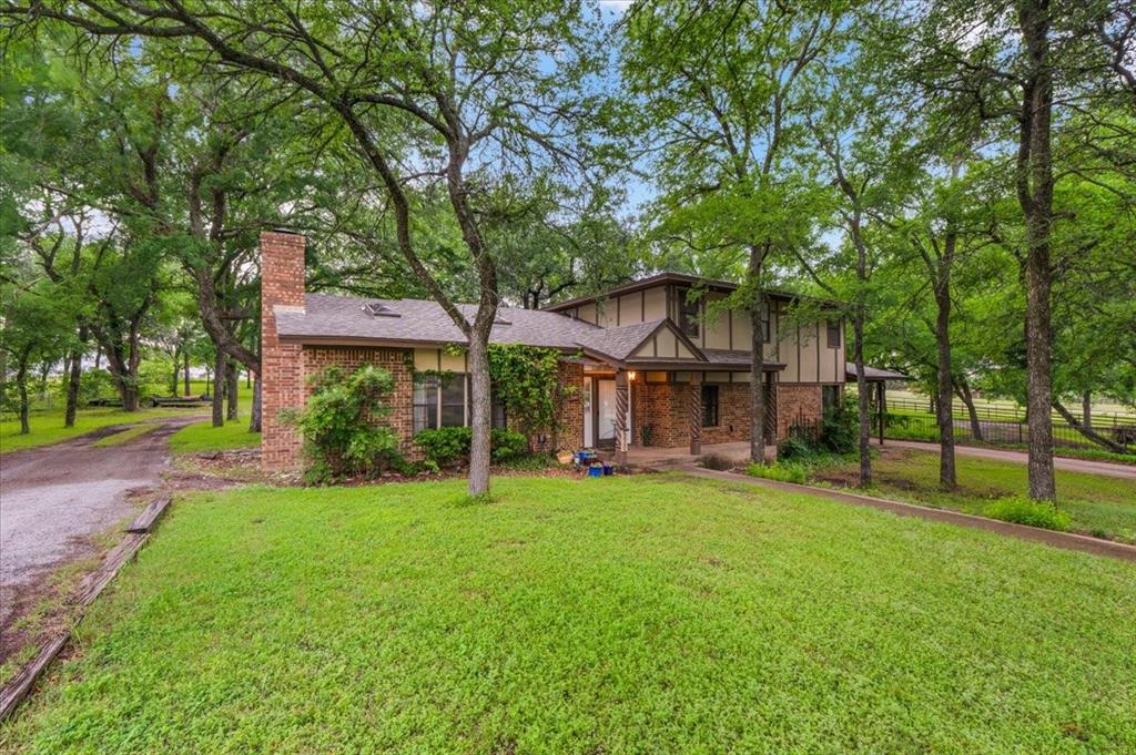 4 bedroom 3 bath home in highly desired Aledo ISD. Tired of same old cookie cutter floorplans, this isn't it! First living room has huge stone fireplace for a morning cup of coffee by the fire. Second living room is massive. Kitchen has plenty of cabinets and granite counters. Primary bedroom  has walk in closet and large ensuite bath with walk in shower. Bedrooms two and three with Jack in Jill bath. Back downstairs for bedroom four off the living room, then over to your private office. Now step outside to heavily treed yard on almost an acre. Not one but two circle drives. One in front and one that circles the house to provide ample parking. Sit out back on your deck under the shade trees. A huge 30' by 40' shop insulated with electricity and AC. Just seconds from I20 for easy access to work, HEB, Costco, restaurants, and anything else you could want. Only 10 minutes from lake Weatherford. . Don't let this opportunity get away!