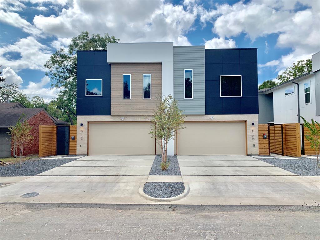 Exceptional contemporary duplex — No HOA — minutes from Love Field, Downtown Dallas, Medical District & Dallas North Tollway. 10-ft ceilings up and down, floor-to-ceiling Low-E windows, hardwood flooring up, pre-wired smart home. Gourmet kitchen with double waterfall quartz island, custom soft-close cabinetry, professional gas range & built-in fridge. Spa-inspired primary bath with dual vanity and rain + standard showerheads. Flexible first-floor suite or office with full bath. Huge sliding doors to large turf and gravel back yard + patio.