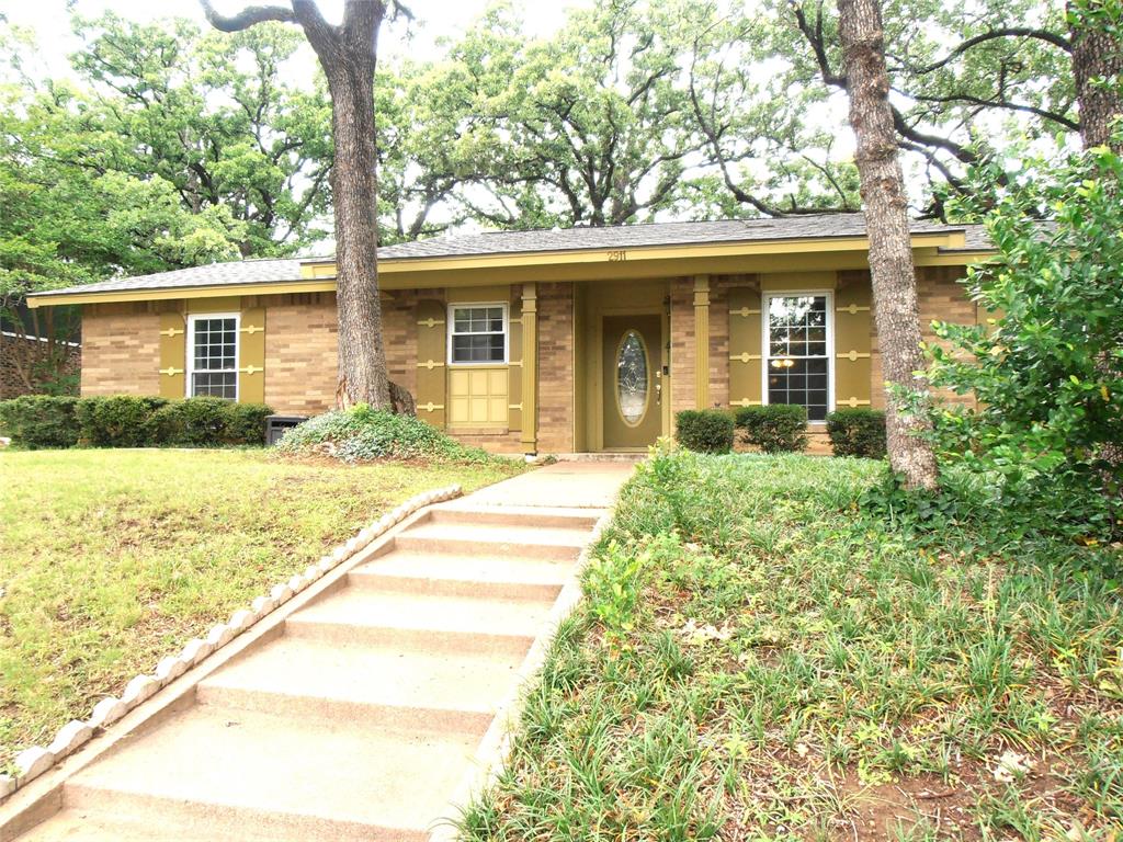 AMAZING FAMILY HOME WITH 3 BEDROOMS AND TWO BATHS INCLUDING THE PRIMARY SUITE WITH ADJOINING BATH. 
THERE ARE TWO LIVING AREAS. THE FRONT LIVING AREA FEATURES WOOD FLOORS, CEILING FAN AND VIEW OF LUSH FRONT LAWN.
THE SPACIOUS FAMILY ROOM WITH CEILING FAN AND FIREPLACE OPENS TO DINING AREA AND SUNNY KITCHEN AS WELL AS THE ENCLOSED PATIO-SUNROOM. THE SHADY WOODED BACKYARD ALSO FEATURES A STORAGE BUILDING. 
A LARGE CONCRETE COVERED AREA IN BACKYARD IS A GREAT SPACE FOR GRILLING, ENTERTAINING OR PLAY TIME.
NEW ROOF MAY 2026. WOODLAND WEST IS A MATURE DESIRABLE STABLE NEIGHBORHOOD WITH GREAT SCHOOLS AND IS CLOSE TO DINING AND SHOPPING!