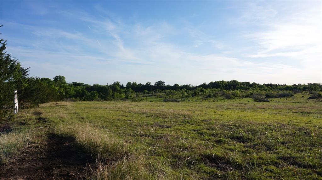 Looking for the perfect acreage for your new home?  This is it!  Conveniently located just a few miles outside Sherman city limits, this 3-acre multi-parcel offers beautiful views and peaceful serenity.  Desirable but limited deed restrictions are in place to protect your homestead investment.  Co-op water and electric service this area, individual septic system is required by the county.  Lot 1 is 2.0 acres and Lot 2 is 1.0 acre. Please register showing requests as noted in agent showing instructions. Be advised, land is in its natural state; dress accordingly and be prepared for brush, tall grass, rocks, uneven and(or) muddy ground surfaces, snakes, ticks, etc.  Cattle are currently present on the land, do not attempt to approach cattle.  All info deemed reliable but not guaranteed.  Buyer and buyer's agent to verify any and all information.