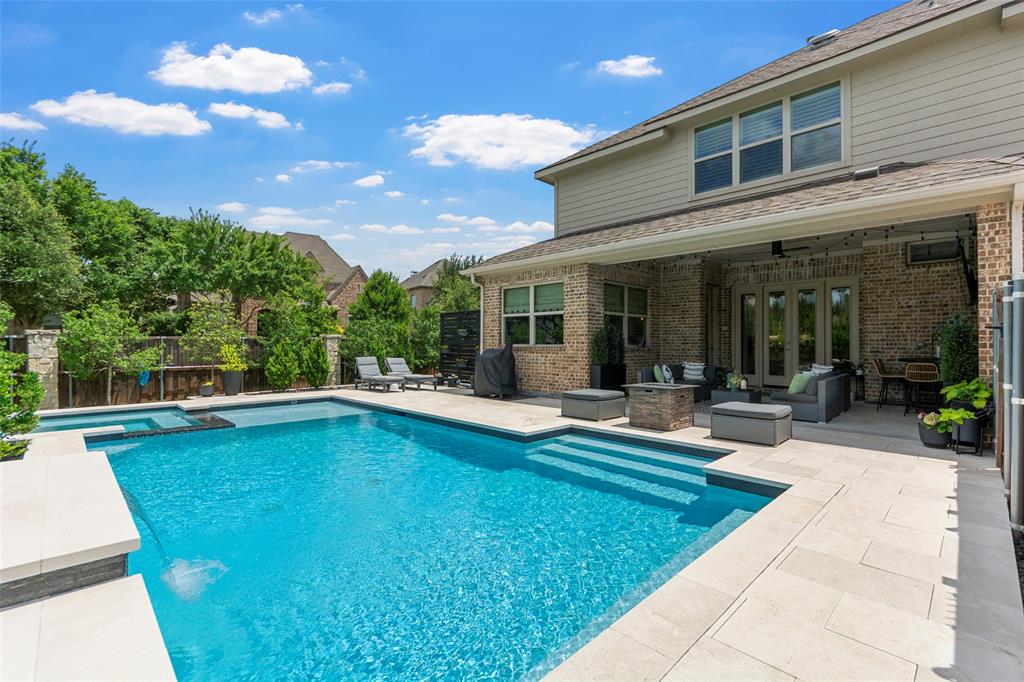 CUSTOM Highland Home with a sparkling pool & spa located on a corner lot, on a cul de sac street, in the coveted neighborhood of StarCreek of West Allen. ORIGINAL OWNER - So much pride in ownership! 6 Bedrooms, 6 full and 2 half bathrooms and 4,864 square feet of living space - this home has it all! Great home for multi-generational living with primary suite & second bedroom with ensuite bathroom on the first floor! Charming curb appeal & elevation with inviting gated front porch says 'Welcome Home'! Foyer with soaring ceilings and stunning staircase. Living room with striking stone fireplace. Gourmet kitchen with granite counters, center island, stainless steel appliances, gas cooking, coffee bar, huge walk-in pantry, & eat-in area. Large planning room off the kitchen with built-in desks & shelves - perfect for second office area. Bonus mud room with built-in storage and bench. Executive office with custom built-in cabinets and privacy French doors. Formal dining room with space for a large table and dry-bar area. Hand-scraped hardwood floors, custom wood shutters, designer lighting & lots of high-end finishes throughout this gorgeous home. Primary suite with luxury bath with dual vanities, large makeup vanity with desk, walk-in shower with dual showerheads, and walk-in closet with custom closet system. Upstairs game room & media room is an entertainer's dream, so much space for movie night, game night or watching your favorite team play. 4 additional large bedrooms upstairs - All 6 bedrooms have their own ensuite bathroom. Your own personal backyard oasis is ready for some summer fun with sparkling pool & spa, large covered patio, fire pit & yard space for pets or playtime. Enjoy the resort-style amenities that StarCreek has to offer - two community pools, clubhouse, playground, sports court, & access to Cottonwood Creek Trail. Prime location close to lots of dining, shopping and entertainment! You do NOT want to miss out on this amazing opportunity in Allen ISD!