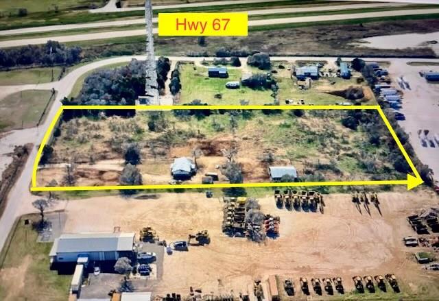 Excellent opportunity with almost 5 flat acres with immediate access to Hwy 67 in fast growing Cleburne-Keene area. This parcel is outside city limits offering the buyer many options to utilize the land:  residential, farming, agricultural, livestock, commercial, storage, multi-family, RV or Mobile Home, etc.  There are established businesses in the area. The home on the property could be rehabbed into a small office (newer roof). Excellent location. Buyer to verify with City & County on permits needed for proposed businesses. Co-op Water, Electric and Septic onsite.