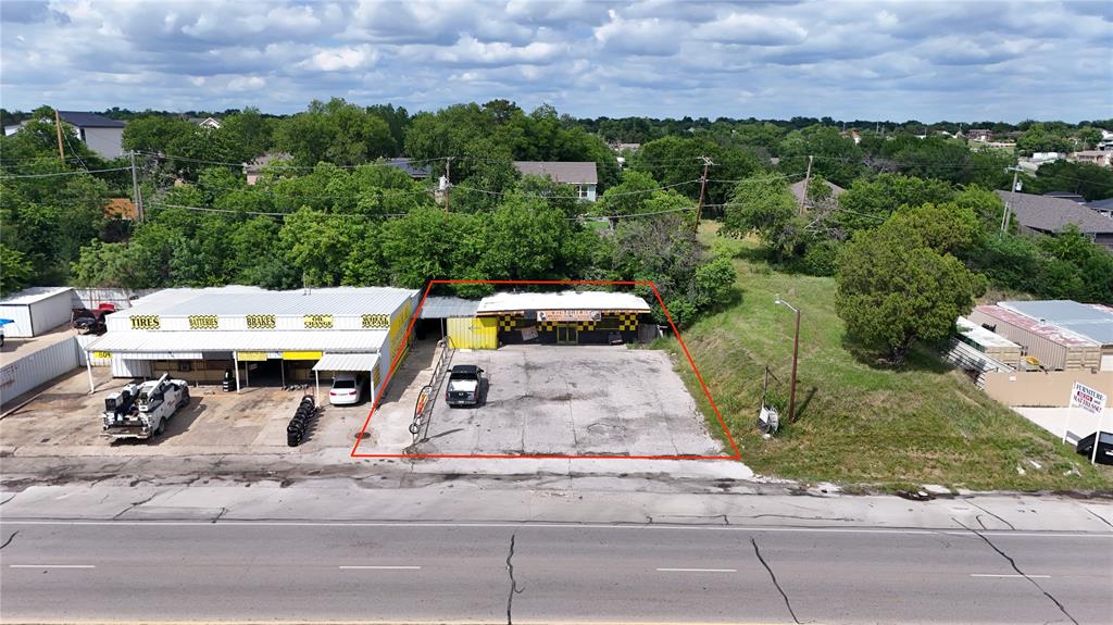 Seller Finance Available - Positioned along the high-traffic corridor of Jacksboro Hwy in Fort Worth, this commercial property offers a great opportunity for an owner-user or investor looking to establish or expand their business. Currently operating as a tire shop, the property features excellent visibility, easy access, and strong daily traffic exposure. The site is well-suited for automotive, mechanic, tire, retail, warehouse, or service-related businesses. Conveniently located minutes from the Fort Worth Stockyards, Downtown Fort Worth, and major thoroughfares, this property sits in a growing commercial area with continued development and business activity nearby. Whether you’re looking to continue the current operation or bring a new concept to the area, this location offers strong potential and flexibility.