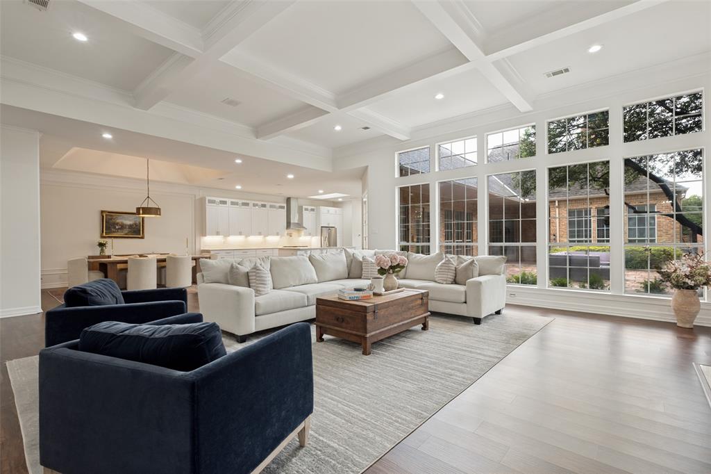 Located in a highly desirable Dallas enclave, this completely reimagined residence showcases extensive updates, thoughtful design, and exceptional functionality throughout. Boasting over $300k upgrades, the living room, kitchen, and dining areas were transformed into one expansive open-concept space with walls removed to create seamless flow for both entertaining and everyday living. Brand-new flooring and fresh paint extend throughout the entire home, complemented by updated fixtures in nearly every room. The redesigned kitchen offers generous prep space, abundant cabinetry, and effortless connection to the main gathering areas. Significant improvements include the addition of a new bedroom and bathroom, a renovated guest bath, and an upgraded laundry room featuring new countertops and sink. Spacious secondary bedrooms provide flexibility for guests, office use, or multigenerational living, while the private primary suite offers comfort with an ensuite bath and 2 XL separate walk-in closets. Additional storage is located around every corner. Enjoy a low-maintenance lifestyle with HOA-covered community grounds care and convenient access to major corridors, premier shopping, dining, and top-rated private schools. A rare opportunity offering modernized living in one of Dallas’ most consistently desirable locations.