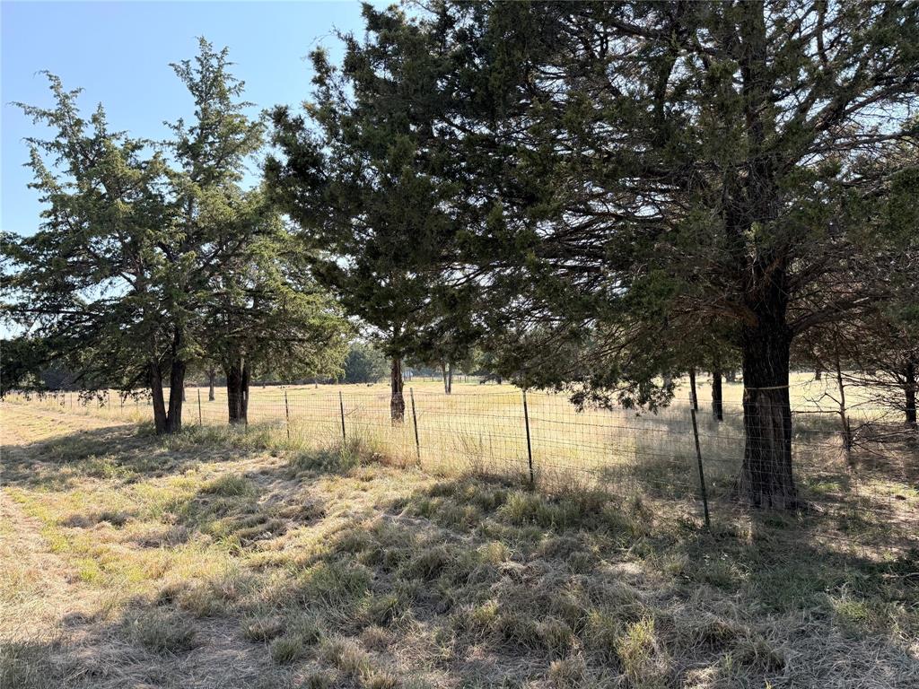9 acres of pasture-land waiting for your vision of a homeplace or your animals homeplace.  With No Deed Restrictions, build what you want and  how you want.  The property is totally fenced with gated access. This 9 acre tract is being divided out of a 20 acre tract.  Currently in Ag Valuation, Contact Cooke County Appraisal District on carrying that over to protect your future tax break.