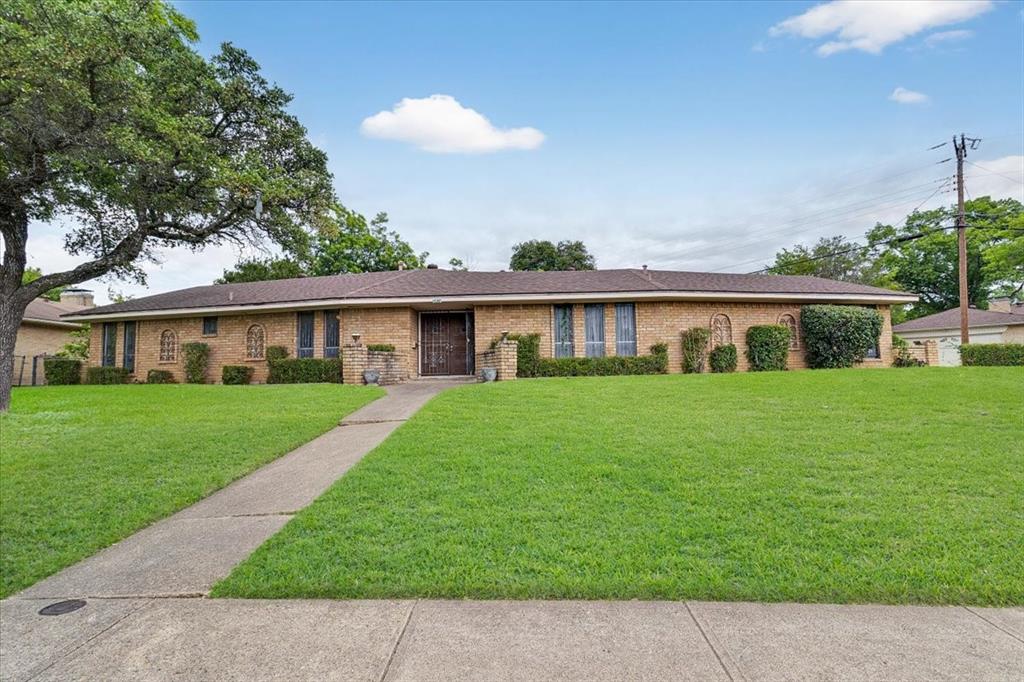 SELLER IS OFFERING A 10K CONCESSION!!!! A rare opportunity awaits in the heart of Oak Cliff! Nestled on one of the largest corner lots in the neighborhood, this cherished one-story home is being offered for sale for the FIRST TIME in nearly five decades!!! This beauty is Full of character, space, and endless potential! This homes has provided countless memories and now this property is ready for its next chapter.

Step inside to discover formal living and dining areas and a warm wood-burning fireplace that anchors the family room.  This versatile floor plan features 3 bedrooms, including a Jack-and-Jill bathroom layout. With two full bathrooms and generous living spaces throughout, this home offers the solid foundation today's buyers are searching for.

Yes, it needs a refresh...but that's where the opportunity begins. Bring your vision, creativity, and modern design ideas to transform this timeless property into a stunning showcase home. Whether you dream of an open-concept kitchen, designer finishes, spa-inspired bathrooms, or preserving its classic charm with contemporary touches, the possibilities are endless!

Outside, you'll find an oversized backyard that's hard to come by in today's market. The expansive lot includes a dedicated dog run, mature landscaping, and plenty of room for outdoor entertaining, gardening, a pool, or future additions. A rear-entry garage provides convenience while maintaining excellent curb appeal.

Located just minutes from downtown Dallas, this home offers the perfect blend of neighborhood charm and city convenience. Enjoy easy access to major freeways, shopping, dining, entertainment, and everything Oak Cliff has to offer.

Sold As-Is!!!!!! Whether you're an investor, renovator, or buyer looking to create your dream home, this is a unique opportunity to own a piece of Oak Cliff history on an exceptional lot. Homes with this much potential, land, and location don't come around often.

HVAC 2022. Water Heater 2020.