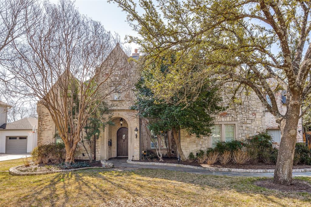 This custom built 4 bedroom, 4.5 bathroom home blends classic elegance with modern functionality, suited both for everyday living and entertaining. Primary Suite, office, and one guest room downstairs and two bedrooms with media room and game room upstairs.
Kitchen was remodeled in 2024 and features a dual-fuel Wolf range, three ovens, and a 48 inch built in Sub-Zero refrigerator. Beautiful custom cabinets, a large kitchen island, and brick floors define the space.    
Primary Suite features a large bedroom and beautiful bathroom, remodeled in 2024. Freestanding soaking tub, separate shower with automated shower system, slate flooring and an expansive walk in closet are just a few of the features that make this space special.  Downstairs office with large closet could be used as a bedroom as needed, but currently serves as a true office space with built in custom cabinets and shelves and wood lined walls and ceilings with beams.   
Upstairs you'll find two generously sized bedrooms, a dedicated media room and a private workspace, providing flexibility for family life, guests or work from home needs.   
The outdoor living areas are exceptional. Mature landscaped backyard is designed for year-round enjoyment. Built in grill with sink, refrigerator, and sonic ice machine are on the back porch and 22x18 covered patio with fireplace provides space for relaxed entertaining including built in heaters for the cooler months. In addition, there is a large sport court with an adjustable height basketball goal and 3 sided surround with pitch back for lacrosse or baseball to complete the recreational scene. This beautiful home is just minutes from Dallas' premier private schools, luxury retail, and fine dining. A private oasis in a coveted location -Preston Hollow at it's finest! (final 3 photos are renderings of what rooms would look like, painted white)