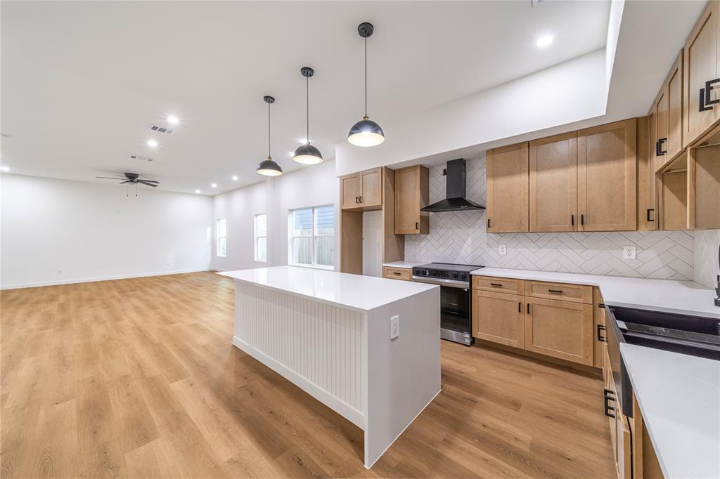Enjoy contemporary living with skyline views in this beautifully crafted three-story duplex. Offering 4 bedrooms, 2.5 bathrooms, and a thoughtfully designed floor plan, this home blends style and functionality. The main level features a bright, open living space that flows seamlessly into the gourmet kitchen, complete with quartz countertops, custom cabinetry, designer lighting, and premium finishes.
The second floor hosts spacious bedrooms, including a luxurious primary suite with a large walk-in closet and elegant ensuite bath. On the third floor, a flexible bonus space provides endless possibilities for a home office, media room, or workout area, while the rooftop terrace delivers stunning views of Downtown Dallas. Perfectly positioned near Trinity Groves, Bishop Arts, Klyde Warren Park, American Airlines Center, and Downtown Dallas, this home offers quick access to some of the city's best restaurants, entertainment, and cultural attractions. A rare opportunity to enjoy modern luxury in an unbeatable location.