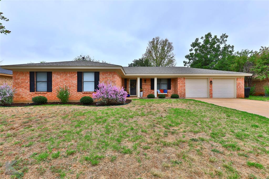 Stop your home searching today with this beauty!  From the moment you drive up, you'll notice the wonderful curb appeal with a welcoming front porch.  Inside, you'll be greeted with lovely wood look flooring that has been remodeled in the last 18 months.  The vaulted ceiling in the living room gives the home a larger feel that wraps around into the darling kitchen.  Even if you don't love to cook, you will just be happy in this cute space!  Updated bathrooms and spacious bedrooms round out the interior of the property.  In the backyard, you will find another covered patio to enjoy, plus an additional covered living space in the corner of the yard.  A small shed conveys with the property as well.  You don't want to miss out on this lovely home, so act fast!