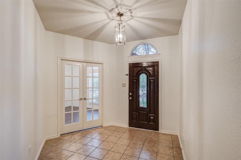 Charming single-story home featuring 3 bedrooms, 2 full baths, and approximately 1,871 sq ft. This well-maintained home offers a functional split-bedroom floor plan with multiple living areas or optional study, ideal for flexible living. Interior highlights include ceramic tile flooring, neutral tones, and ceiling fans throughout. The spacious primary suite features dual sinks, garden tub, separate shower, and walk-in closet. Kitchen includes ample storage with a pantry and adjacent dining area. Additional features include a 2-car garage and covered patio. Conveniently located near major highways, shopping, and dining.
