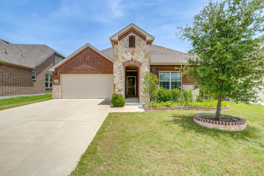 Don't miss this beautifully updated home nestled in the heart of North Fort Worth! The location truly can’t be beat—just minutes from top dining spots, shopping, the library, Costco, Target, a movie theater, and so much more.

Inside, you'll fall in love with the stunning kitchen featuring quartz countertops, stainless steel appliances, crisp white cabinetry with soft-close hinges, and a large island perfect for meal prep or entertaining. The thoughtful upgrades continue throughout the home, including WiFi-controlled thermostat and irrigation system, fiber internet direct-connect in six locations, light dimmers in the kitchen and baths, and upgraded lighting in the kitchen.

Enjoy evenings on the covered back porch, complete with a gas hookup ready for your grill. The private backyard offers both relaxation and charm, with an elm and peach tree adding a touch of nature.

The garage includes a tankless water heater, 220V EV charger, newer overhead door, and additional attic storage. Located in a friendly, well-maintained neighborhood where pride of ownership is evident, this home is the perfect combination of comfort, convenience, and smart living.