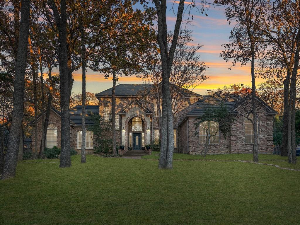 Multiple Offers have been received! the sellers have requested final offers be sent ? Thanks!  in the heart of Southlake Carroll ISD, this stunning 5-bedroom, 4.5-bathroom, 4,083 sq. ft. estate offers a blend of luxury, comfort, and privacy in a prime location close to Highway 114 and top-rated schools. Perfect for entertaining and tranquil living, the meticulously updated home sits on a rare-to-find 1-ACRE wooded lot, offering a true outdoor paradise with lush landscaping, a sparkling pool, spa, and ample space for dining and relaxation. Inside, soaring ceilings, abundant designer lighting, wall niches, new European white oak hardwood floor and designer touches create an inviting ambiance. The open-concept design seamlessly connects the living, dining, and kitchen areas. The NEW gourmet kitchen includes a quartz-topped island, stainless steel appliances, and custom cabinetry. The fully remodeled interior features a downstairs layout with a luxurious primary suite, a guest bedroom, a home office, and a versatile nursery or bonus room. Additional highlights include a 3 Car Garage with Tesla Charge outlet , separate guest room entrance, hardwood flooring, a three-car garage, and updated lighting. Schedule your private tour today