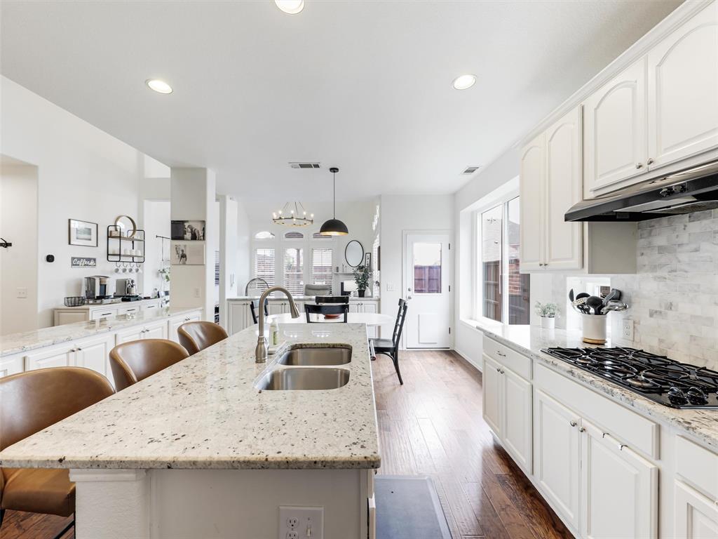WOW! WOW! WOW! STOP SCROLLING NOW! Welcome to an exceptional opportunity in the highly sought-after Fairways of West Frisco. Perfectly positioned alongside the scenic Cottonwood Trail, offering access to miles of biking, hiking, and outdoor enjoyment, all within prestigious Trails of Frisco Golf Club community. Featuring one of the most popular floorplans in the neighborhood, this spacious 4-bedroom, 4-bath home offers a functional layout designed for both everyday living and entertaining. Upon entry, you’re welcomed by a private office complete with beautiful built-ins, French doors, and large windows that fill the space with natural light—ideal for working from home. The open-concept kitchen and family room create a warm, inviting heart of the home. The kitchen boasts abundant storage, a generous pantry, and a large island perfect for entertaining and gathering with family and friends. The expansive primary suite is conveniently located on the main level and includes a private sitting area, an oversized bath with dual sinks and a soaking tub, and a custom closet system for optimal organization. Upstairs, all additional bedrooms are generously sized and thoughtfully laid out with split bathrooms, offering comfort and privacy. A large game room provides the perfect space for family living, entertaining, or relaxing. Zoned to top-rated Frisco ISD schools including Purefoy Elementary, Griffin Middle School, and Wakeland High School. Enjoy being just minutes from the PGA Headquarters, the highly anticipated Fields development, and vibrant Downtown Frisco Rail District—placing dining, entertainment, and future growth right at your fingertips. The home showcases valuable updates designed for both comfort and peace of mind, including brand new energy-efficient windows with a lifetime warranty, fresh interior paint, and new carpeting. Major system improvements include a new AC unit (2025), a newer roof, and a professionally repaired foundation with a transferable warranty.
