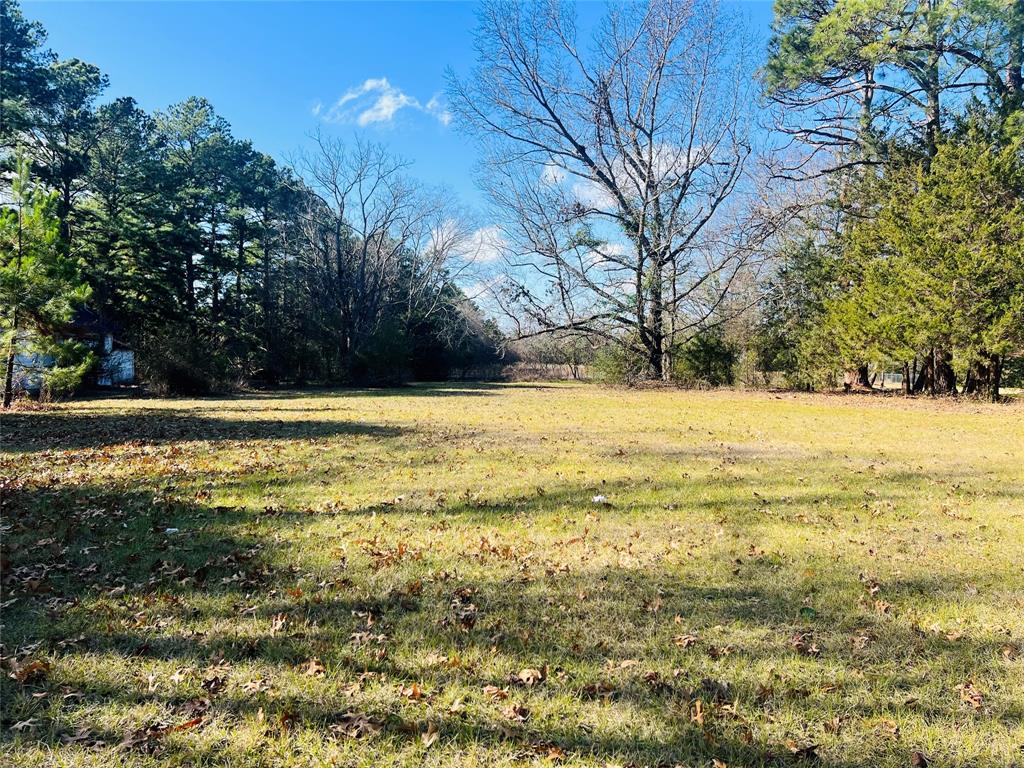 Looking for land close to town? Look no further! 15.4 East Texas rolling acres in Wood County. There is an old farmhouse on the front of the property, that has potential to be restored or come build your dream home. Electric and co-op water available. 90 miles east of Dallas and 50 miles north of Tyler. You don't want to miss this property!