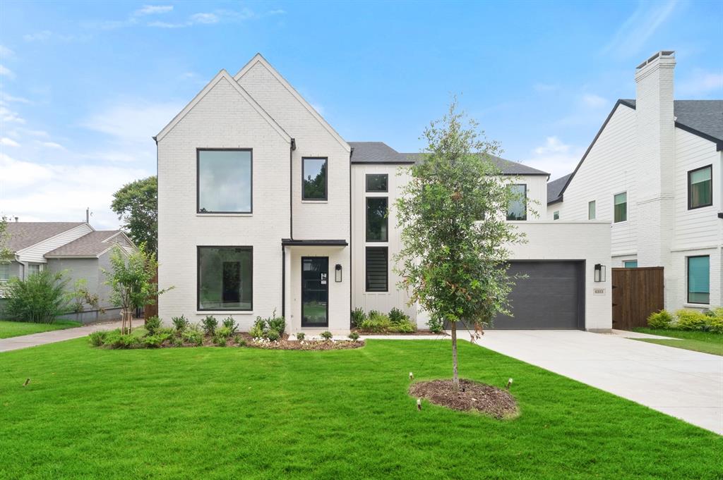 MLS# 21305158 - Built by Homebound - Ready Now! ~ Nestled in the highly desirable Wilshire Heights neighborhood of East Dallas - zoned to coveted Mockingbird Elementary, The Mason arrives dressed in Homebound's striking new Scandinavian Contemporary design package, where clean lines, vertical siding, and warm tones create a home that feels both modern and effortlessly livable. At its heart, an open-concept kitchen is outfitted for the serious home chef: Jenn-Air appliances, Taj Mahal quartzite countertops, and rift-sawn white oak cabinetry set a tone of refined functionality. A butler's pantry with a wine cooler flows seamlessly from the kitchen, extending the same signature quartzite throughout. The kitchen opens to a light-filled great room anchored by a gas fireplace, with a formal dining room and a covered, gas-plumbed patio, ready for the outdoor kitchen of your dreams. The spacious primary suite offers a true retreat with a soaking tub and oversized close, while 4 additional secondary bedrooms and 4.5 secondary baths ensure room for everyone in the home. A generous laundry room and a flex room, pre-wired for sound with a beverage cooler, complete the 2nd level. Includes a 1-2-6 Builder Home Warranty and 3 years of complimentary home automation.