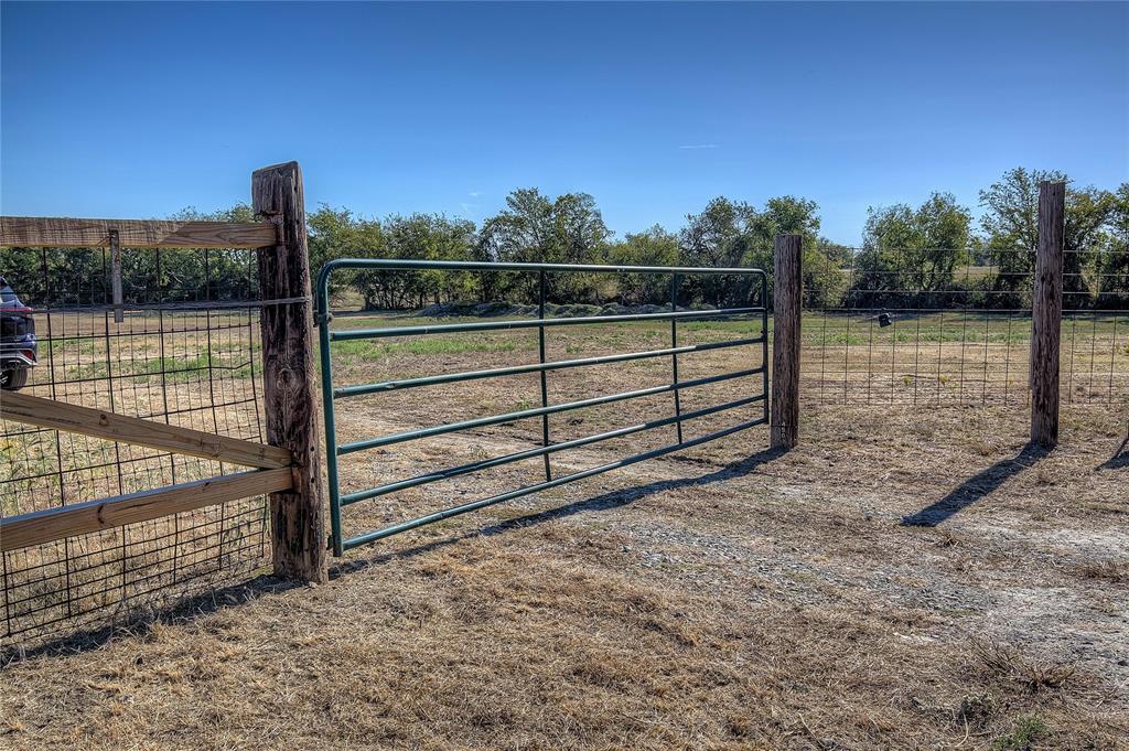 Majestic, 30 Acres Rolling Terrain pasture with Mixed terrain of Pastures and Hardwood Timber.  Presently used for cattle in AG.  Scenic Acreage with Rolling Hills and Diverse Terrain. Stunning parcel of land perfect for Your Dream Home, Recreation or a Development. Location is outside of the city limits with easy access to Highway 80 or Highway 20 for commuters.  Easy access to all new and modern amenities that Terrell has to offer. New County Road in front of the property.  Gated approach. Partial fenced. The property boasts a diverse mix of trees and open fields, offering privacy and natural habitat for wildlife. No Restrictions.